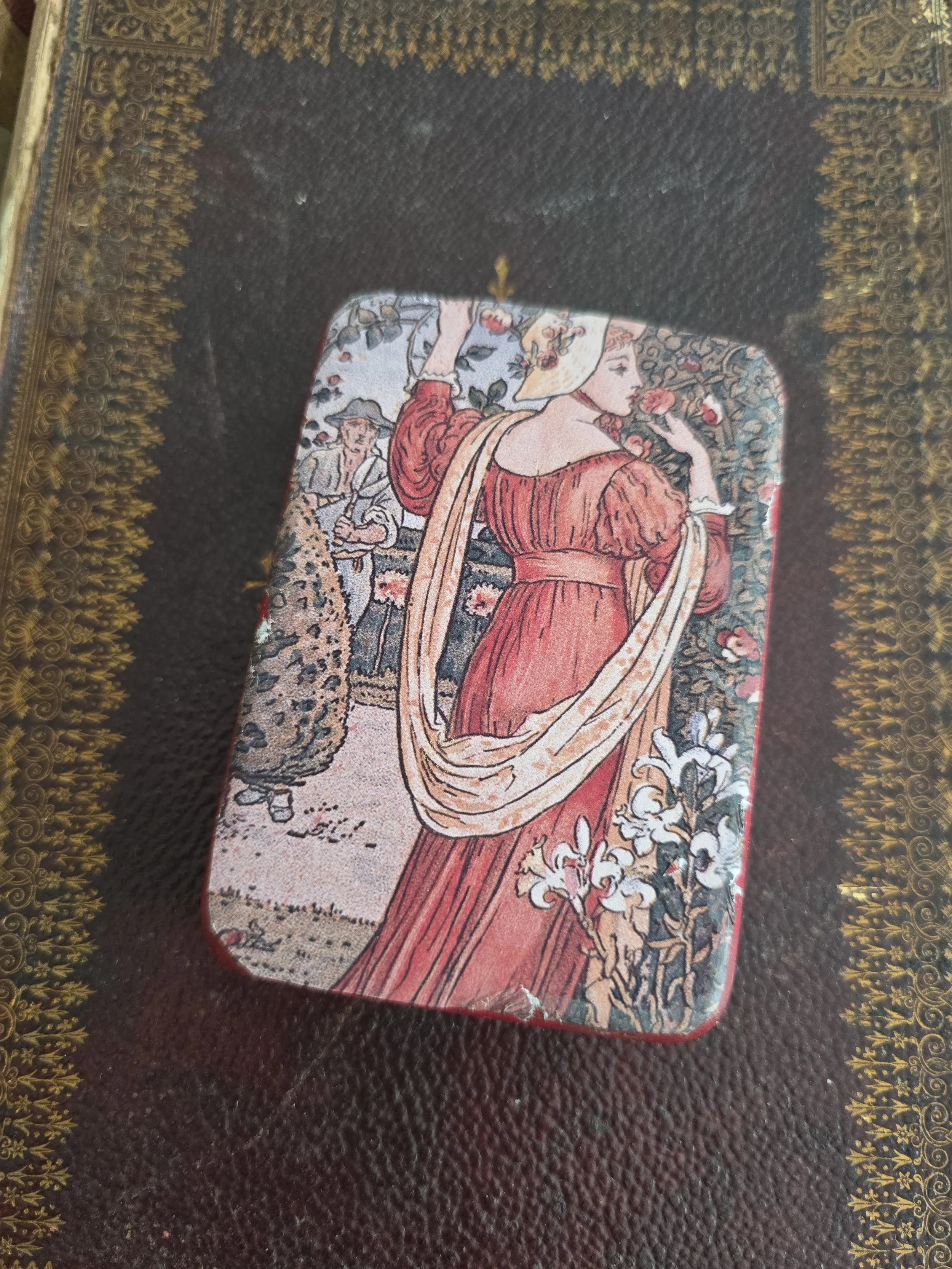 Studio Made vintage tin covered with a Walter Crane illustration scanned from an antique book.
