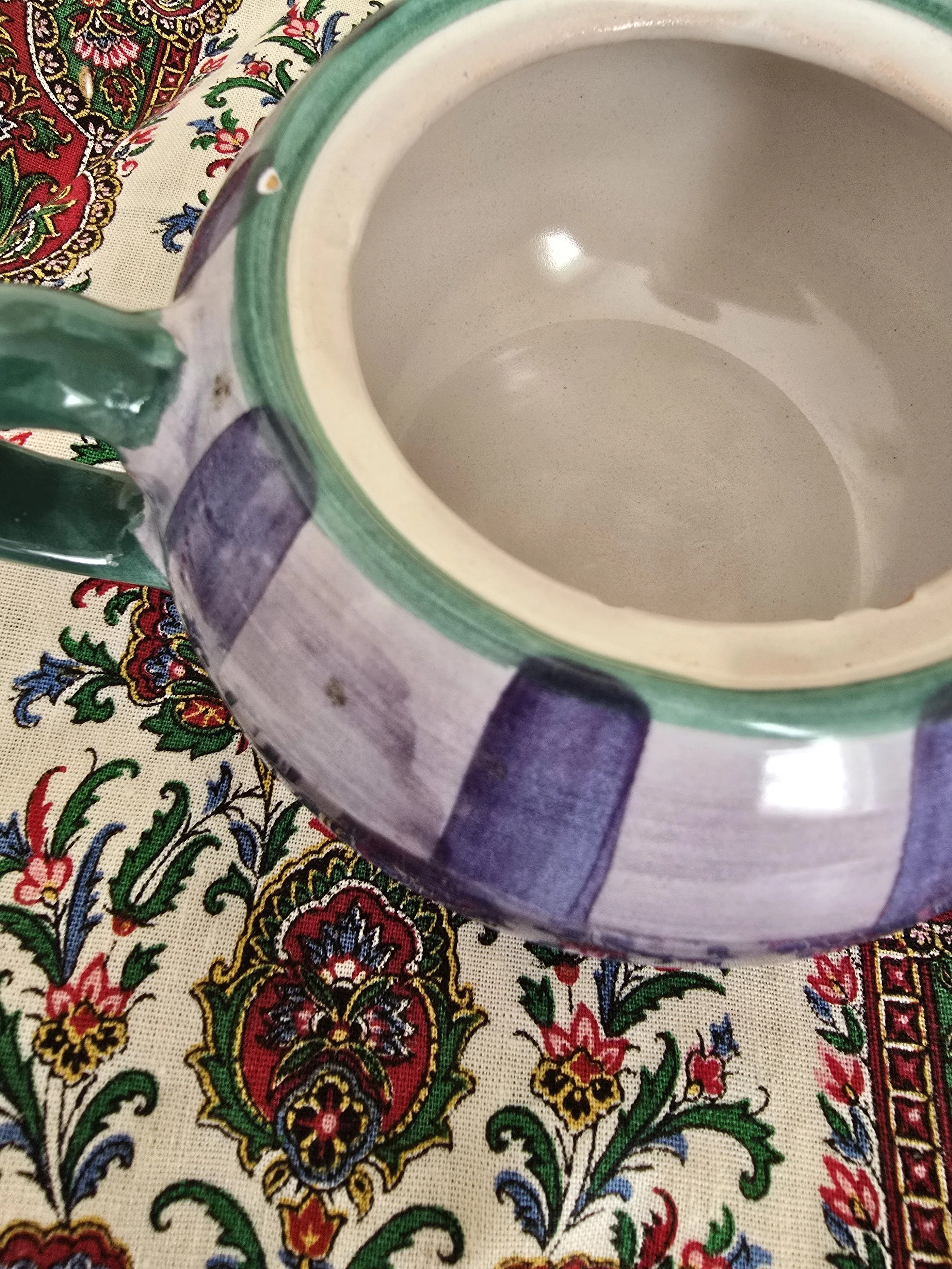 Side angle of small vintage Italian sugar bowl with lid in place