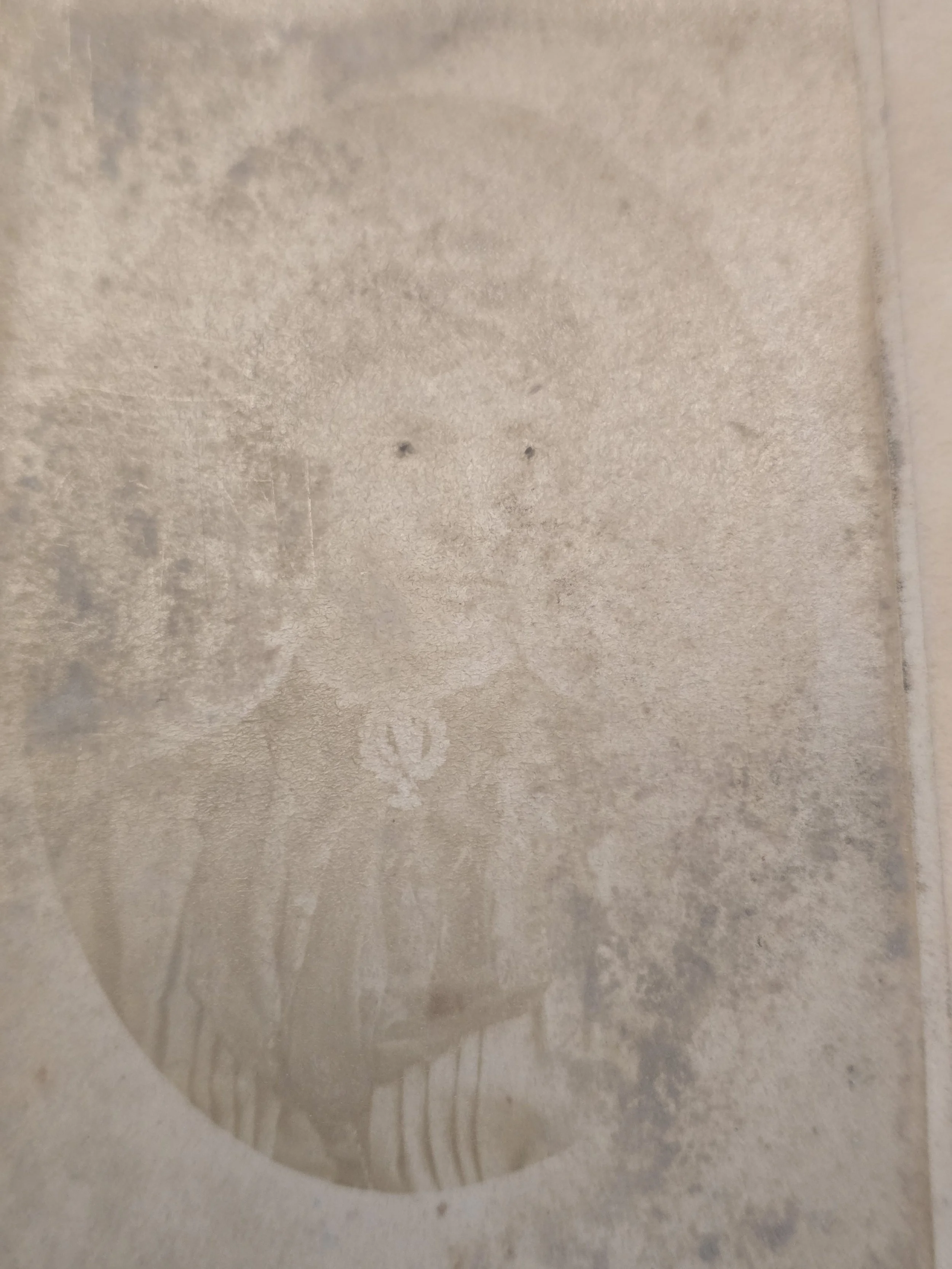 Ghostly Victorian cabinet photograph with heavily faded female portrait