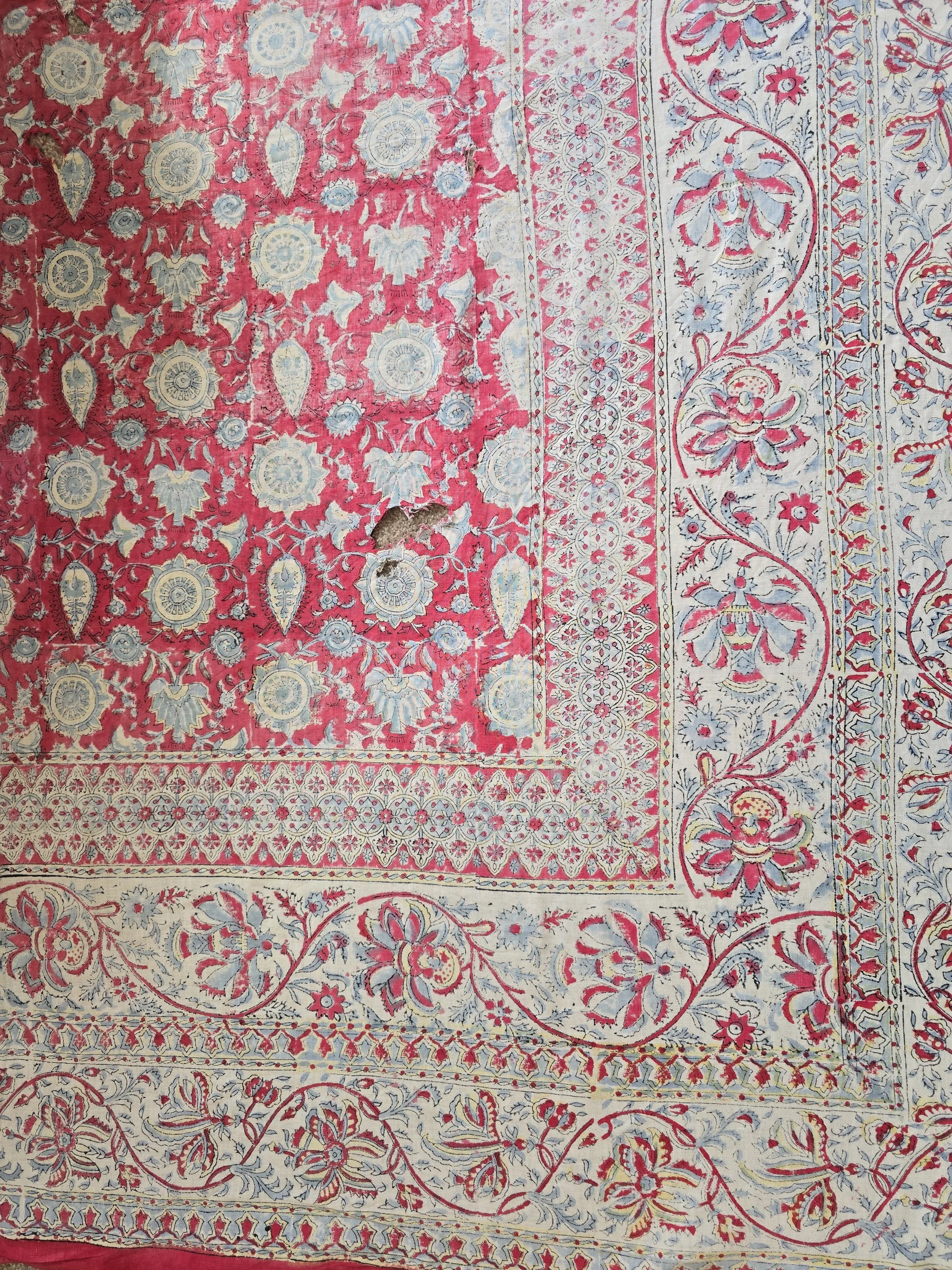 Overview showing wear and tear on floral panel
