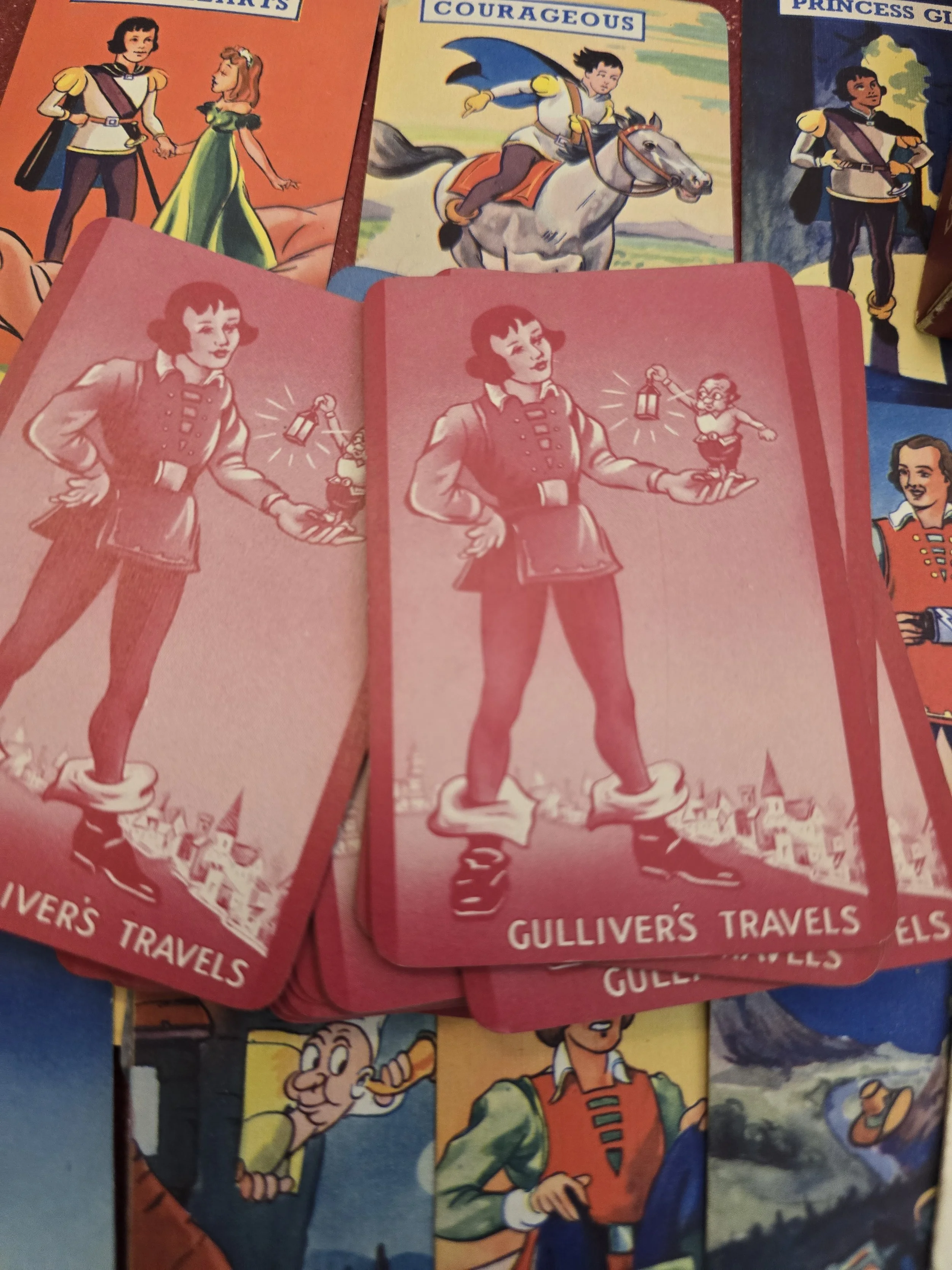 Complete vintage card game set with original box and illustrated cards.