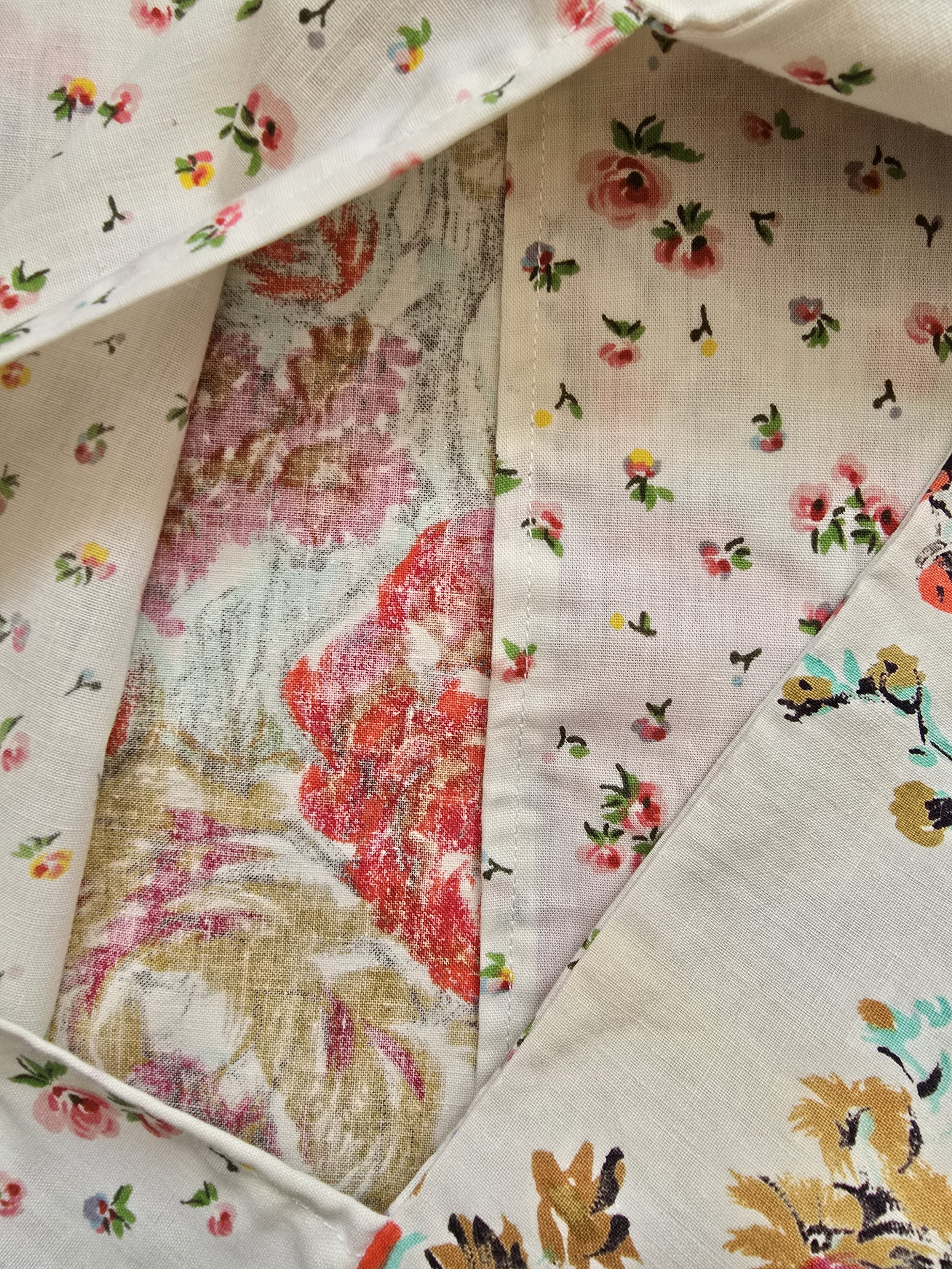 Handmade cushion back showing envelope closure made from rosebud cotton