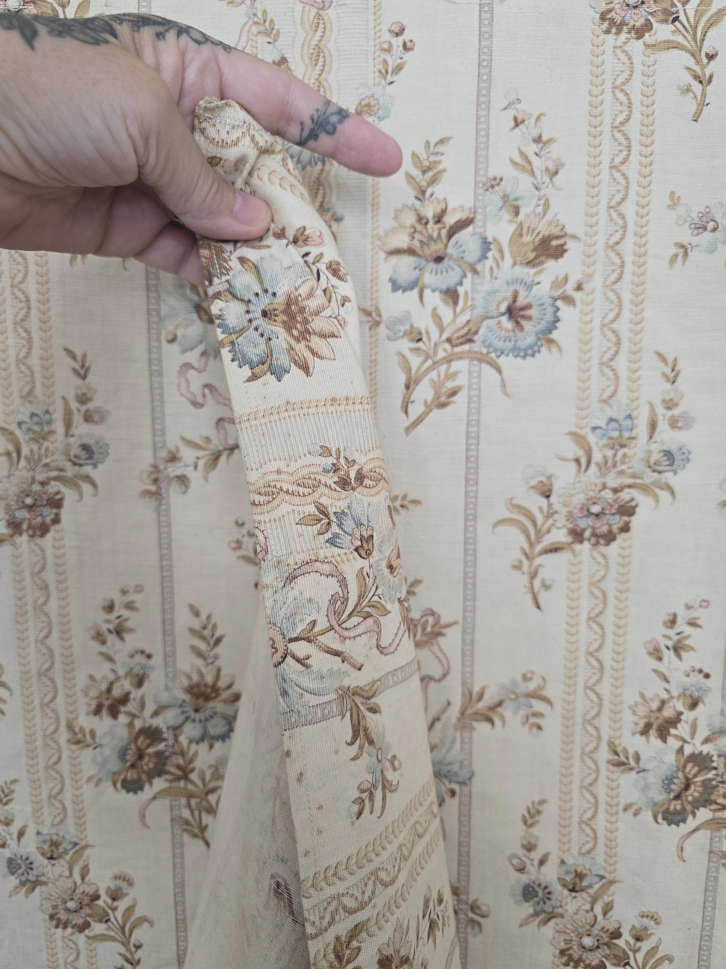 Reverse and original edge of antique French furnishing textile