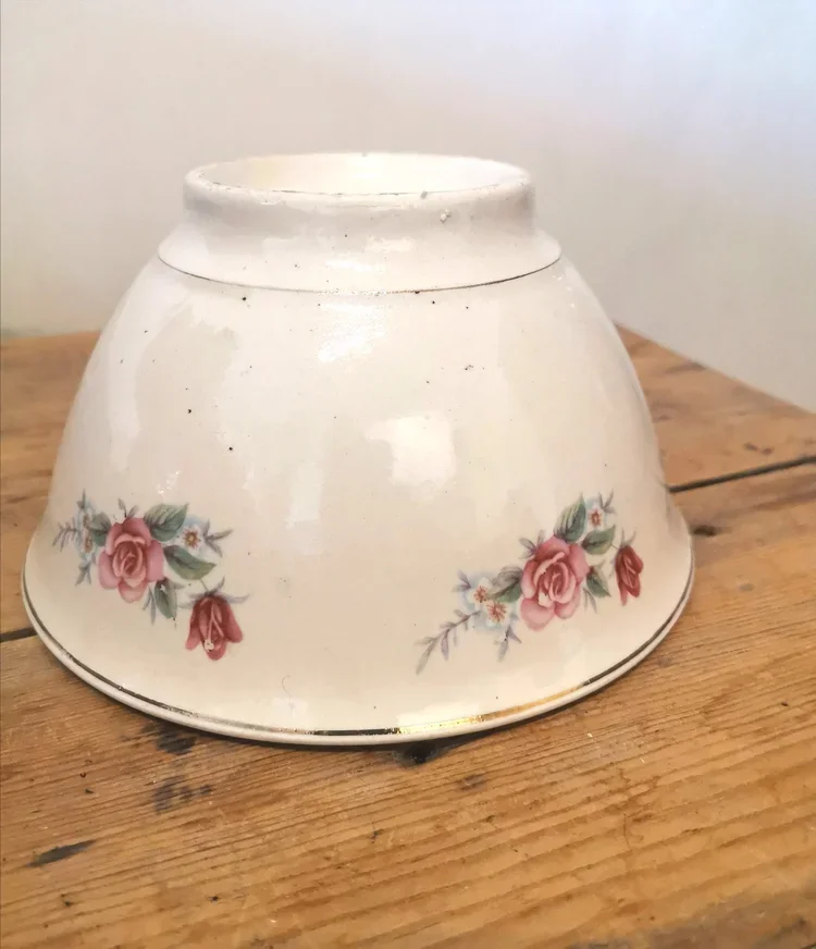 Close-up of rose transfer print on French ceramic bowl