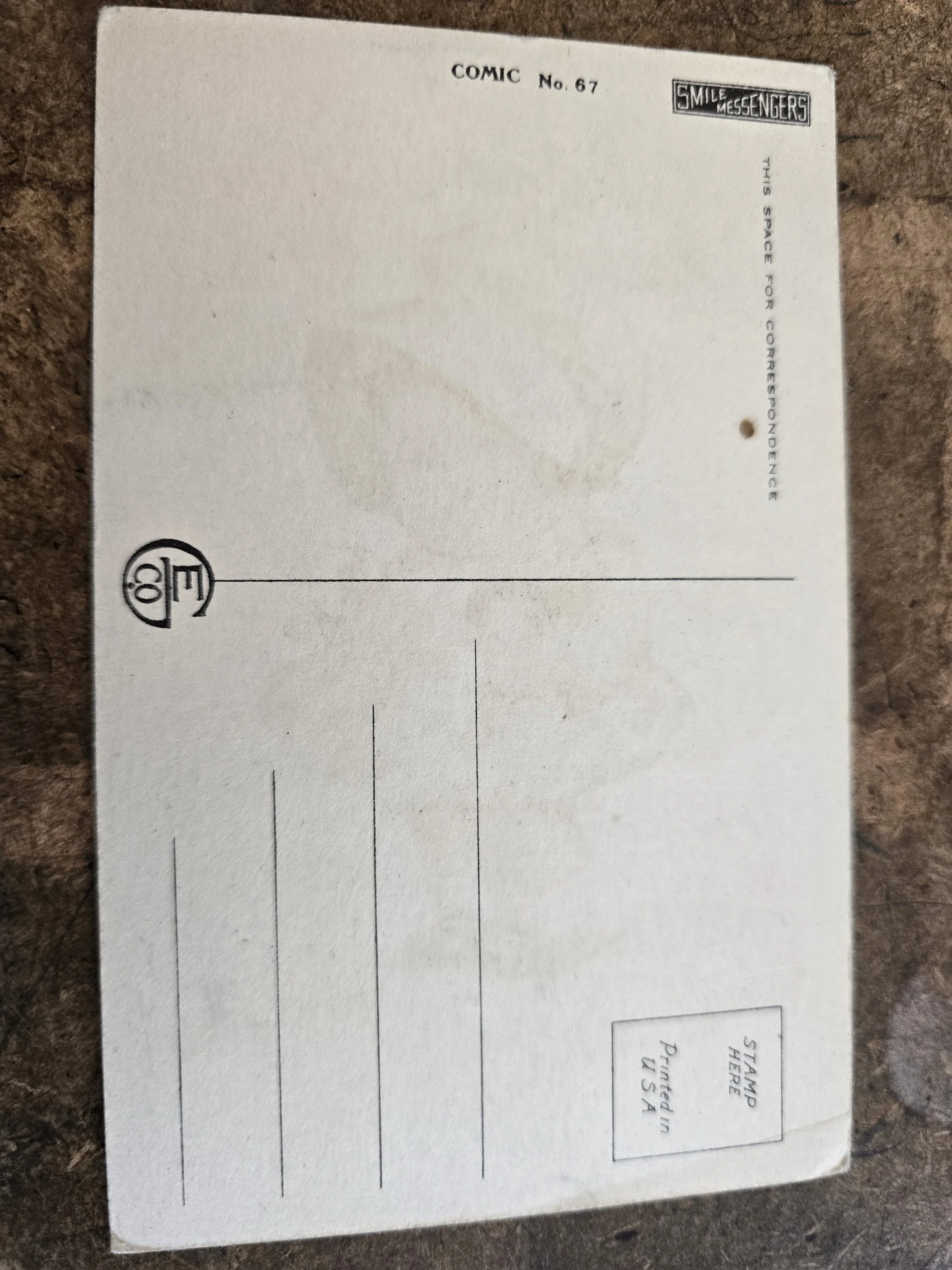 Reverse of unused Smile Messengers postcard printed in USA