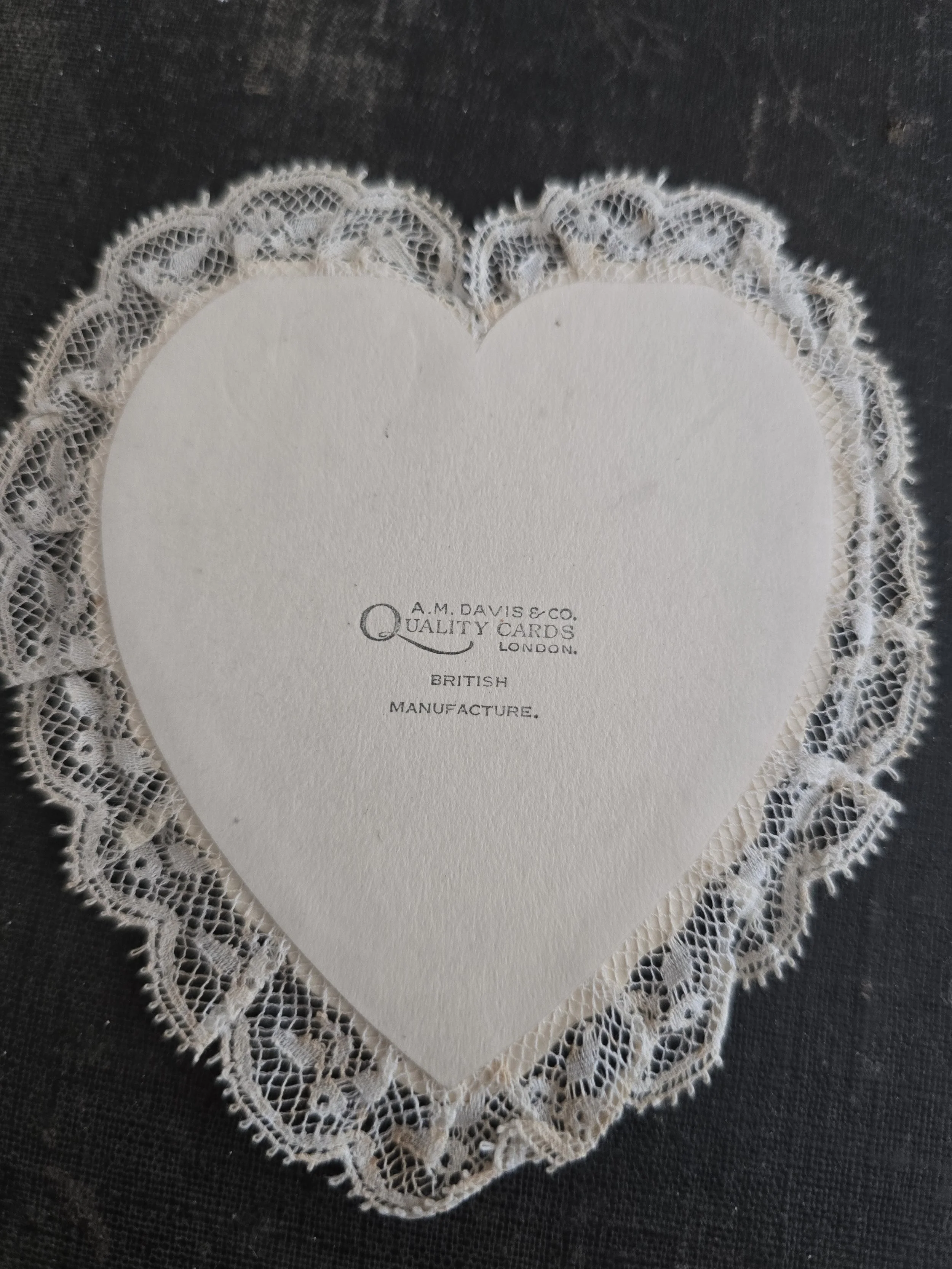 Reverse of heart-shaped Valentine card showing A. M. Davis & Co., London, British Manufacture mark.