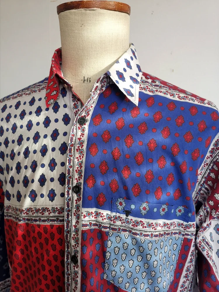 Collar detail showing red and white Provençale print on Souleiado shirt.