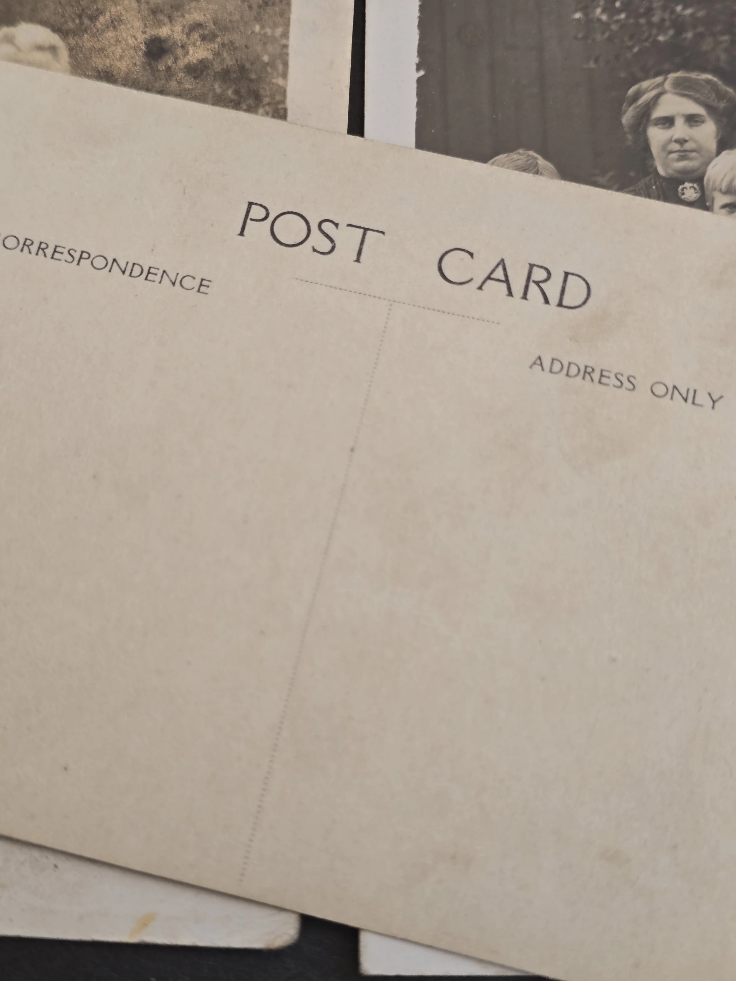 Three related antique family photographs preserved together from the early 20th century.