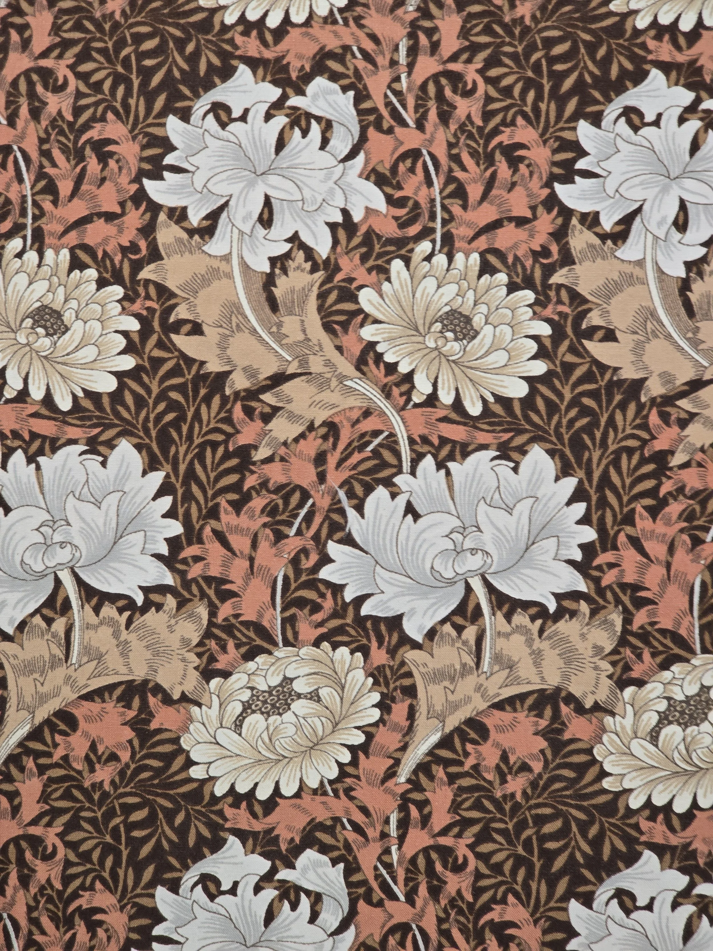 Detailed view of Chrysanthemum Minor fabric showing layered floral pattern.