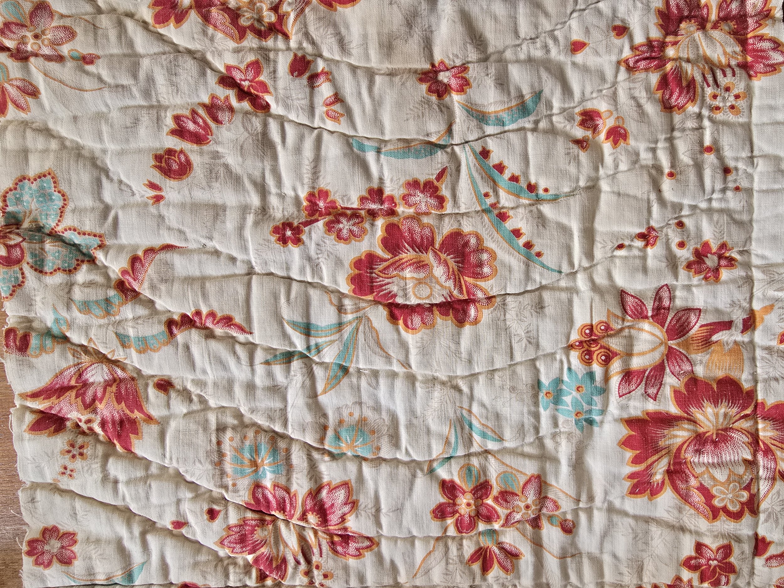 Timeworn scrunched French textile close-up