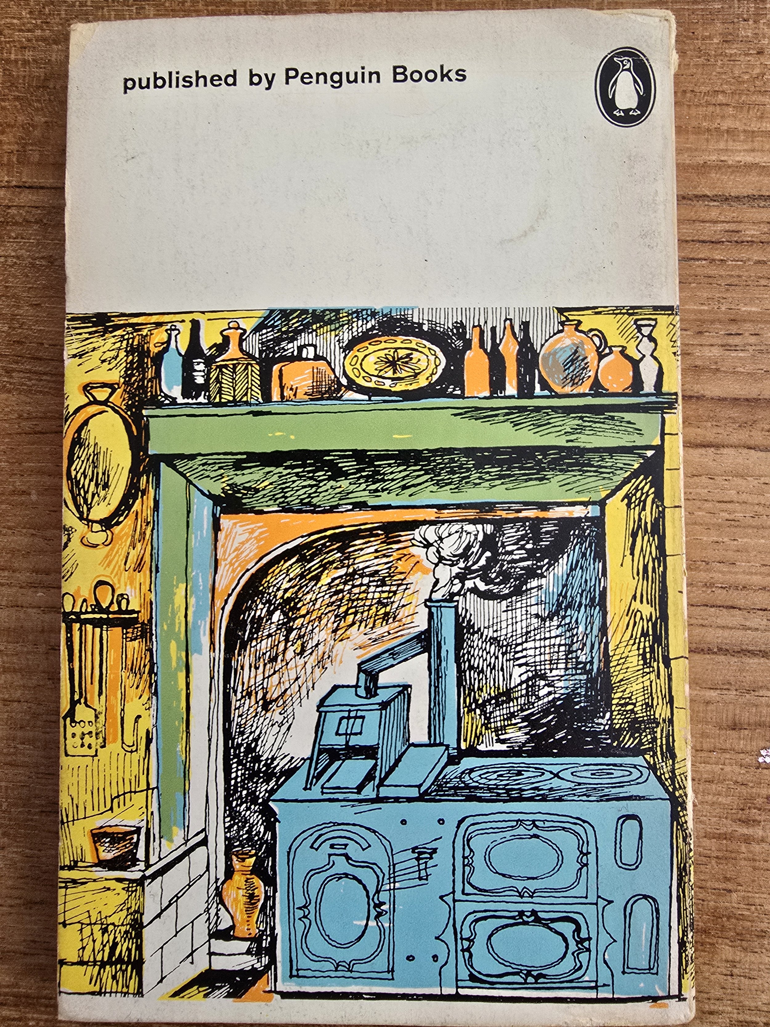 Colourful vintage Penguin back cover featuring a kitchen stove and jars