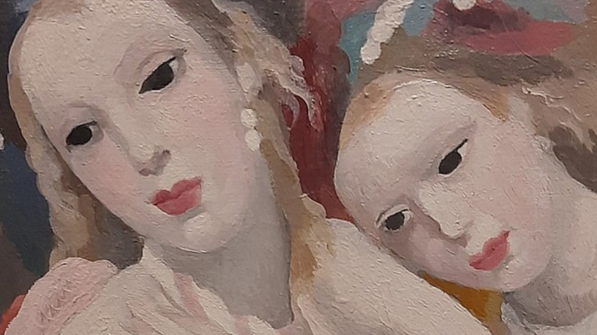 Close-up detail of two women in a Marie Laurencin painting with soft pink lips and pale dreamlike faces.