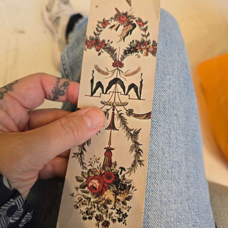 Vintage Clandon Park bookmark decorated with flowers, garlands and birds from the Les Deux Pigeons wallpaper design.