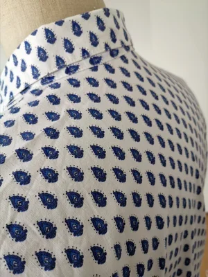Collar detail of vintage Provençale shirt showing fabric pattern.