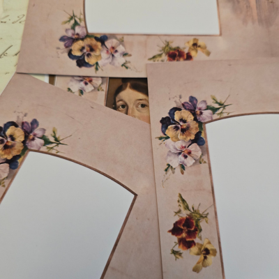 printable frames created from a scanned antique photograph album page, with PANSY flowers, an aged paper background and small painted seascape.