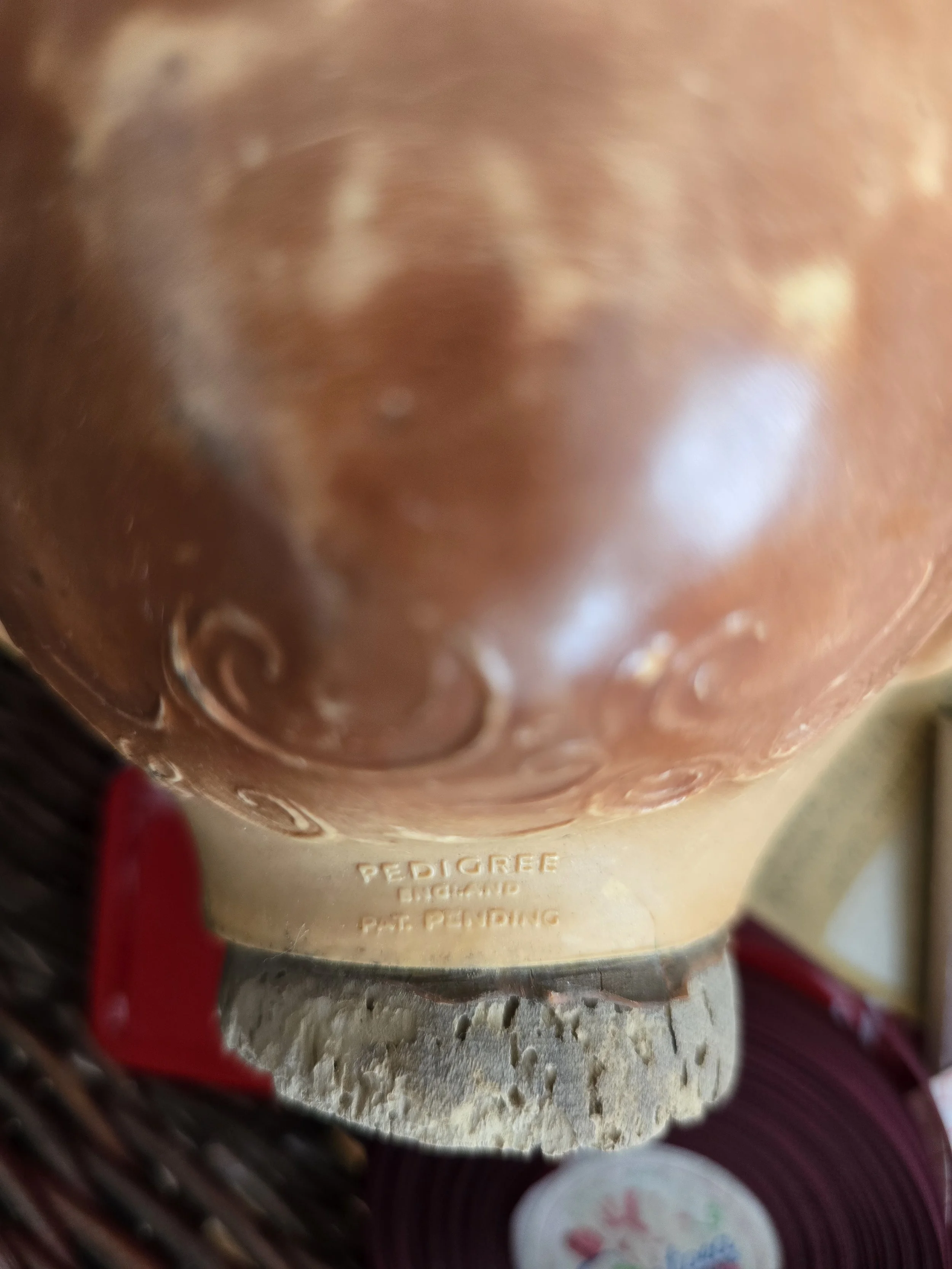back view of original sleep doll head with aged patina