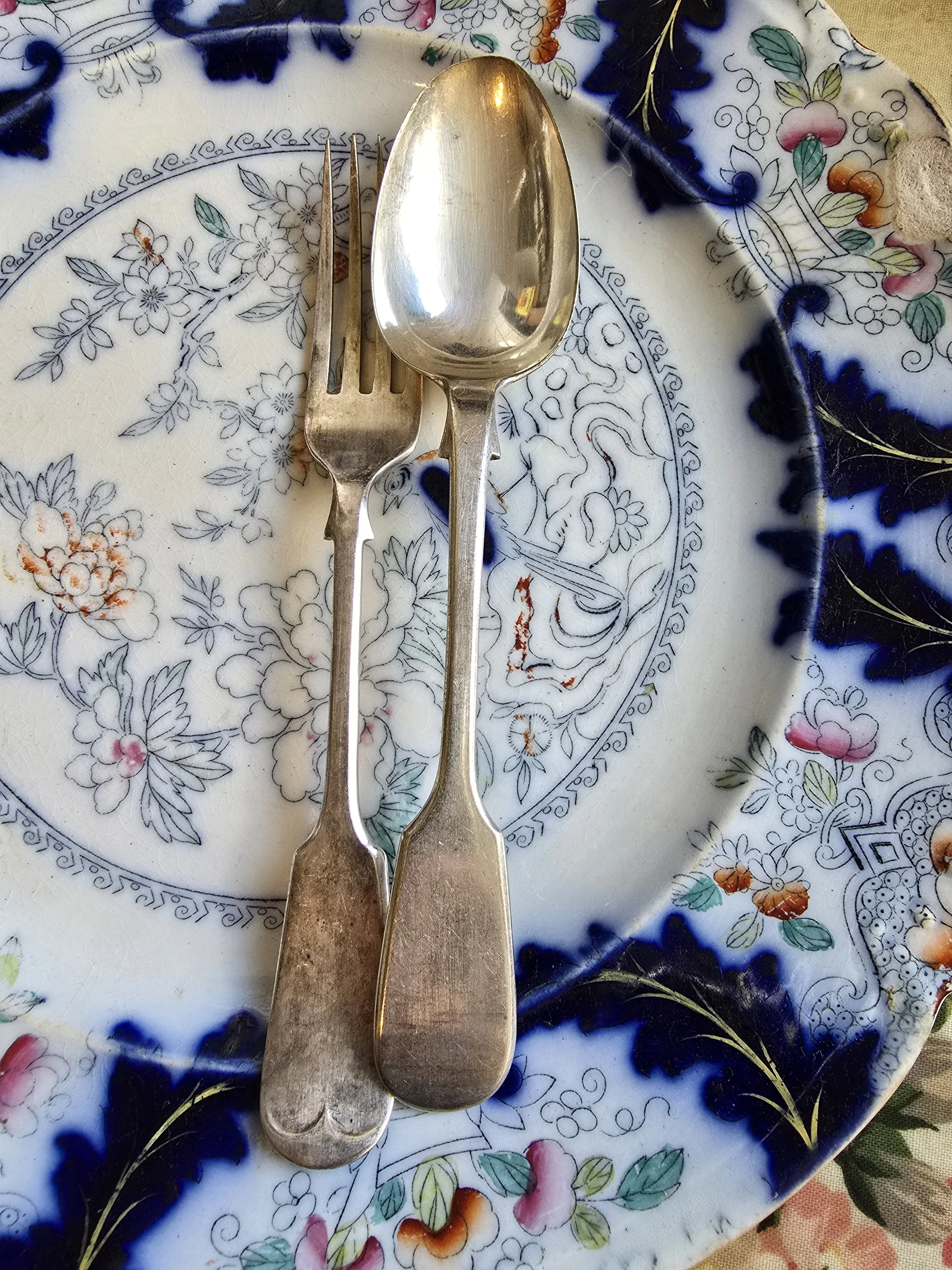 Victorian sterling silver dessert cutlery pair, antique fork and spoon on blue and white plate