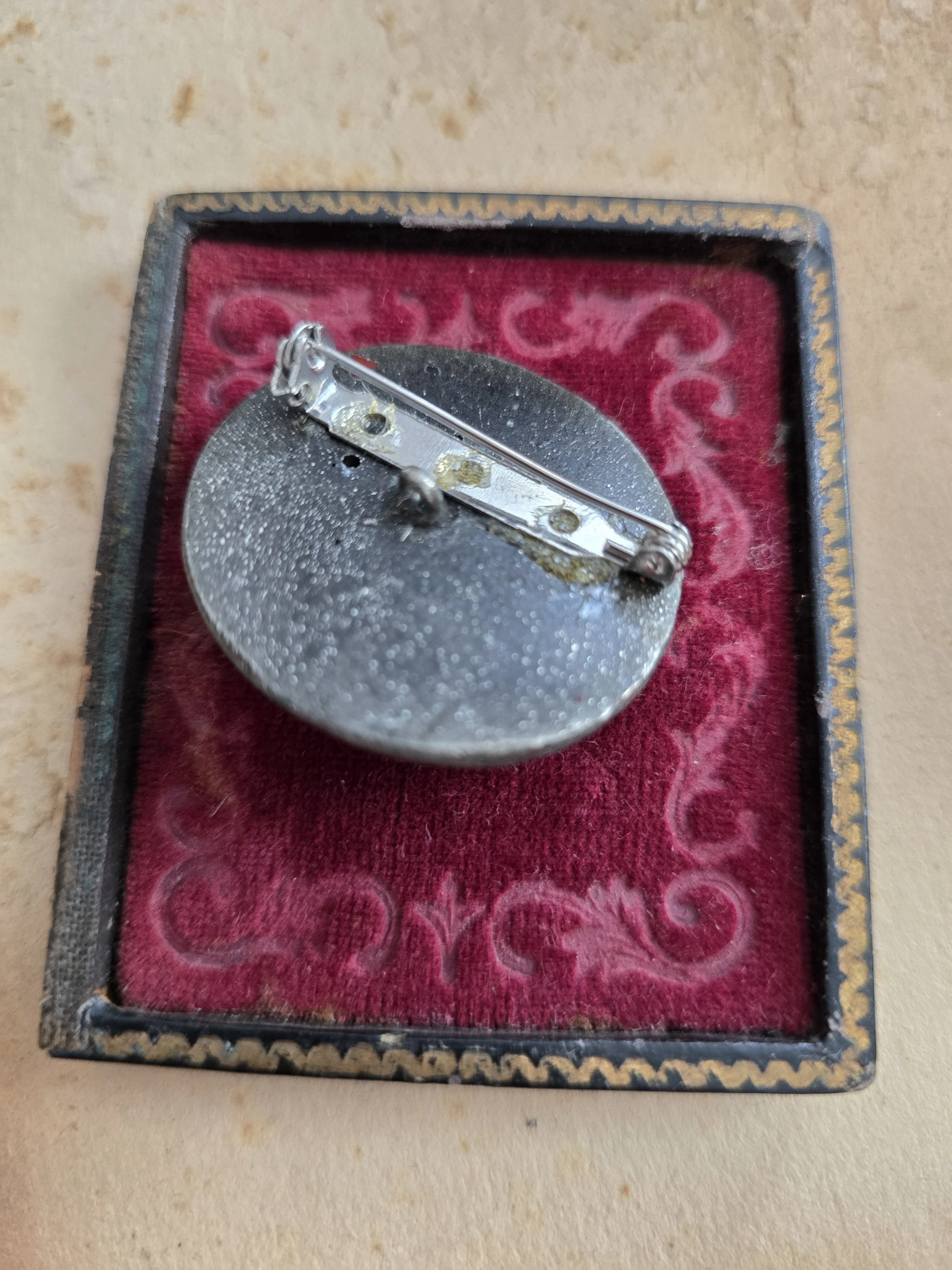 antique decorative metal button brooch