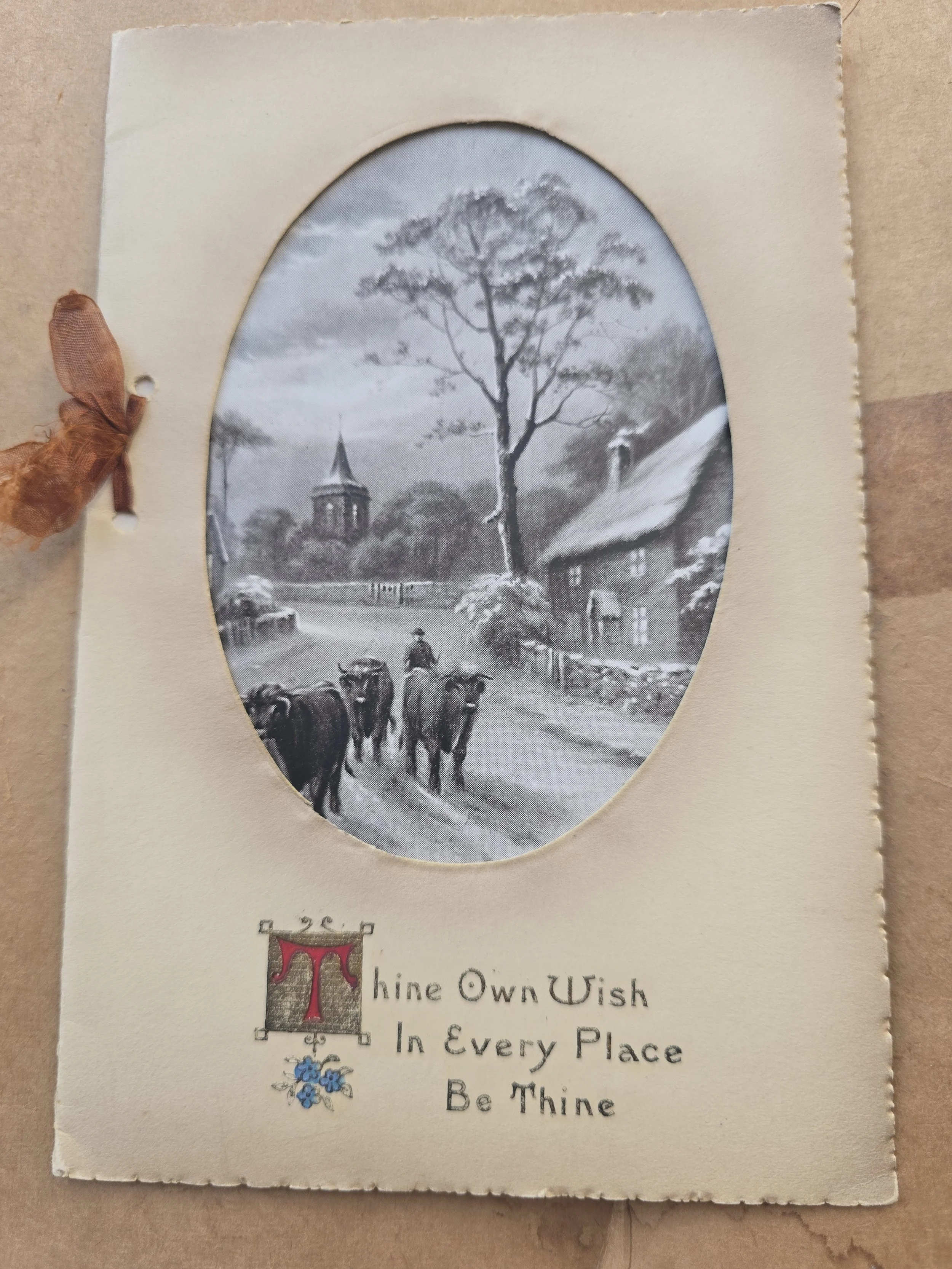 Antique Christmas card dated 1913 with snowy English village and cattle scene