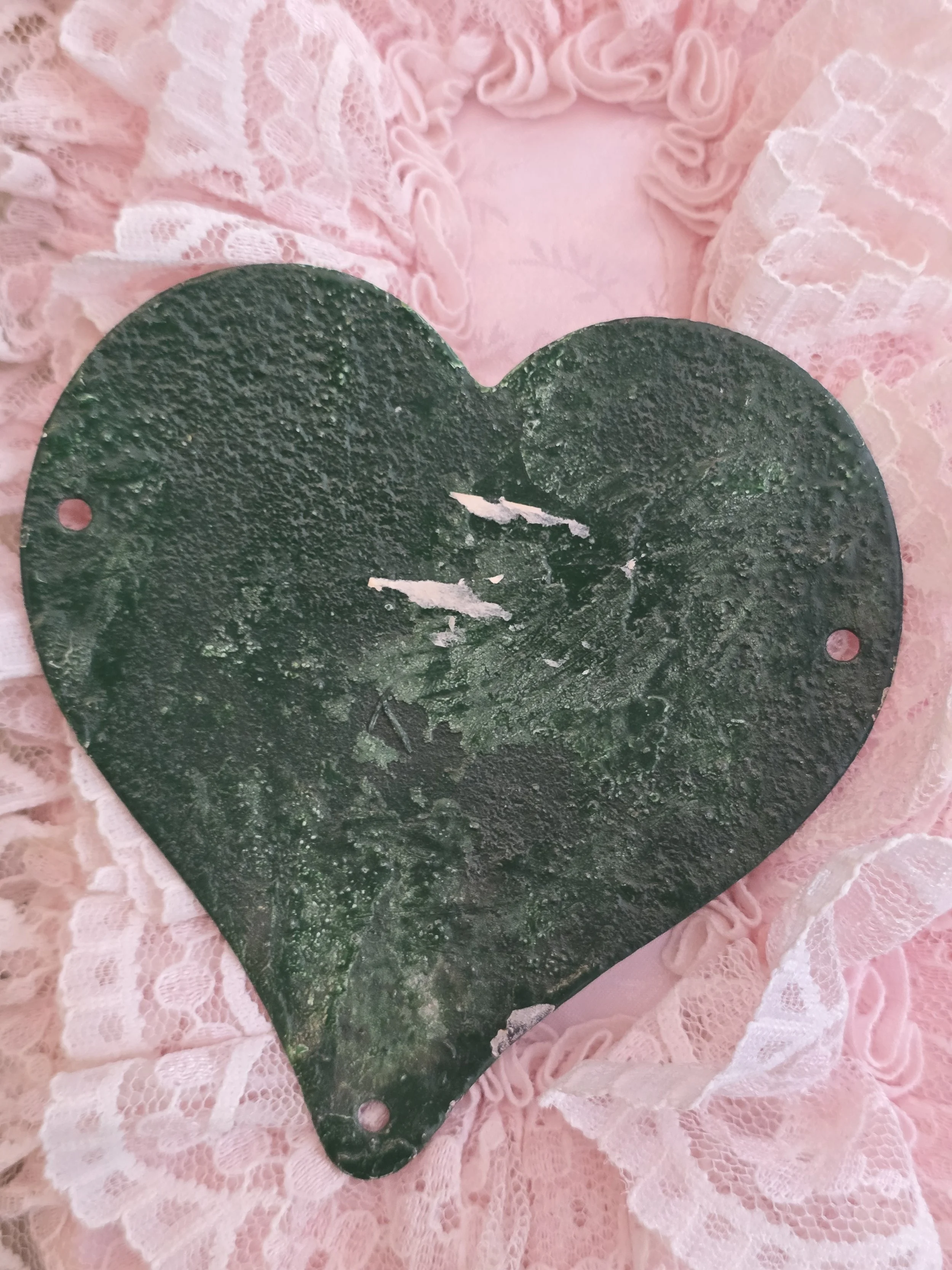 Reverse of vintage French heart-shaped cemetery plaque