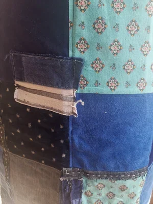 Detail of apron patchwork showing vintage indigo and patterned Provençal cotton
