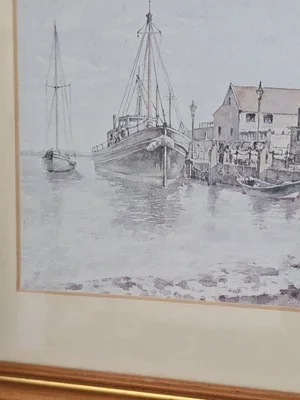 Coastal harbour scene with boats and houses, signed Muriel Owen.