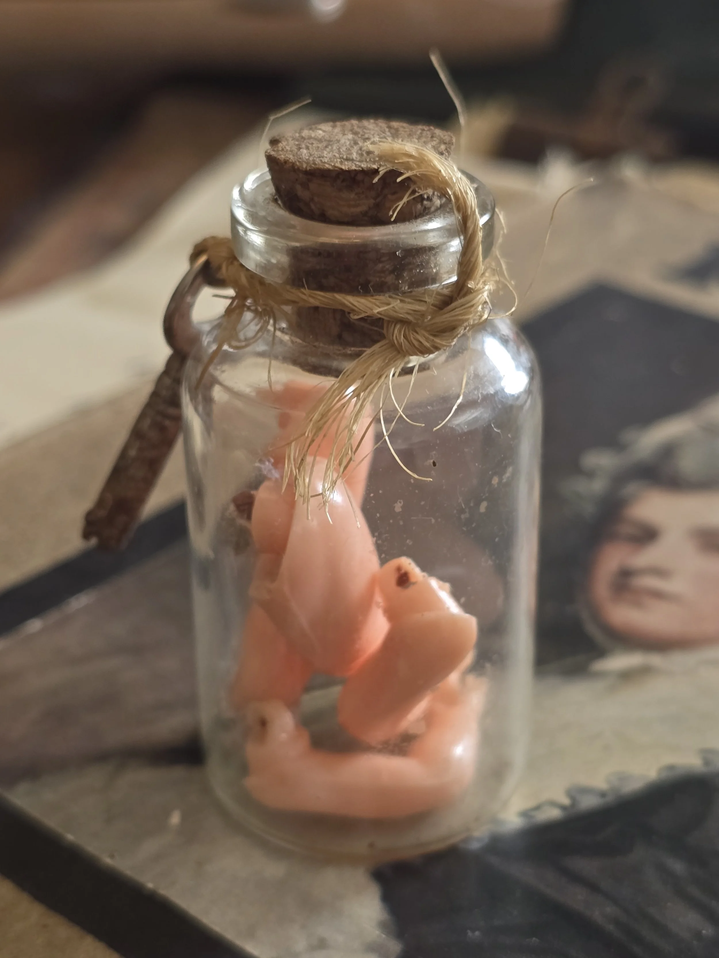 Tiny glass bottle assemblage from the Pomme de Jour studio