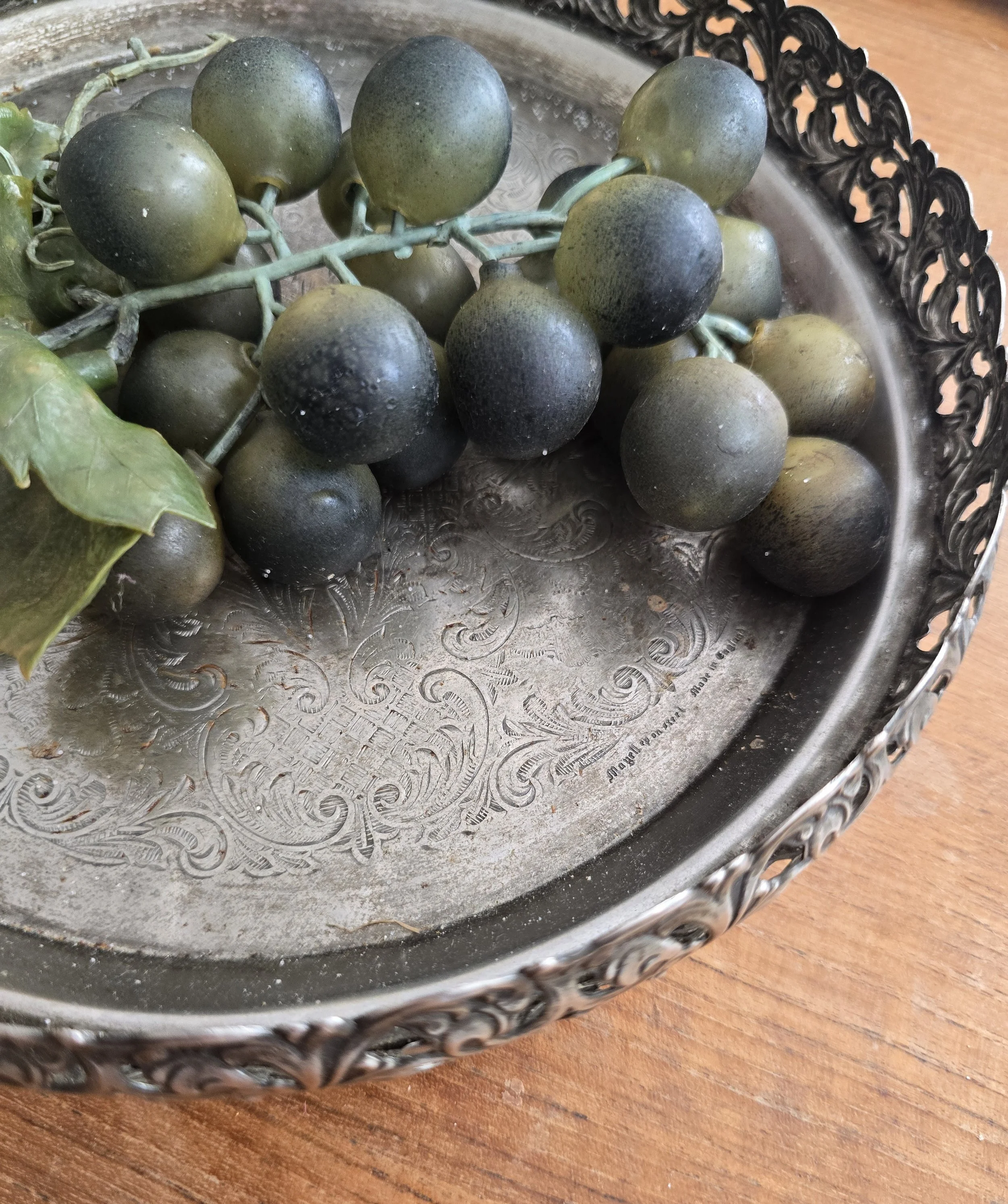 23cm vintage metal tray with aged patina and engraved centre