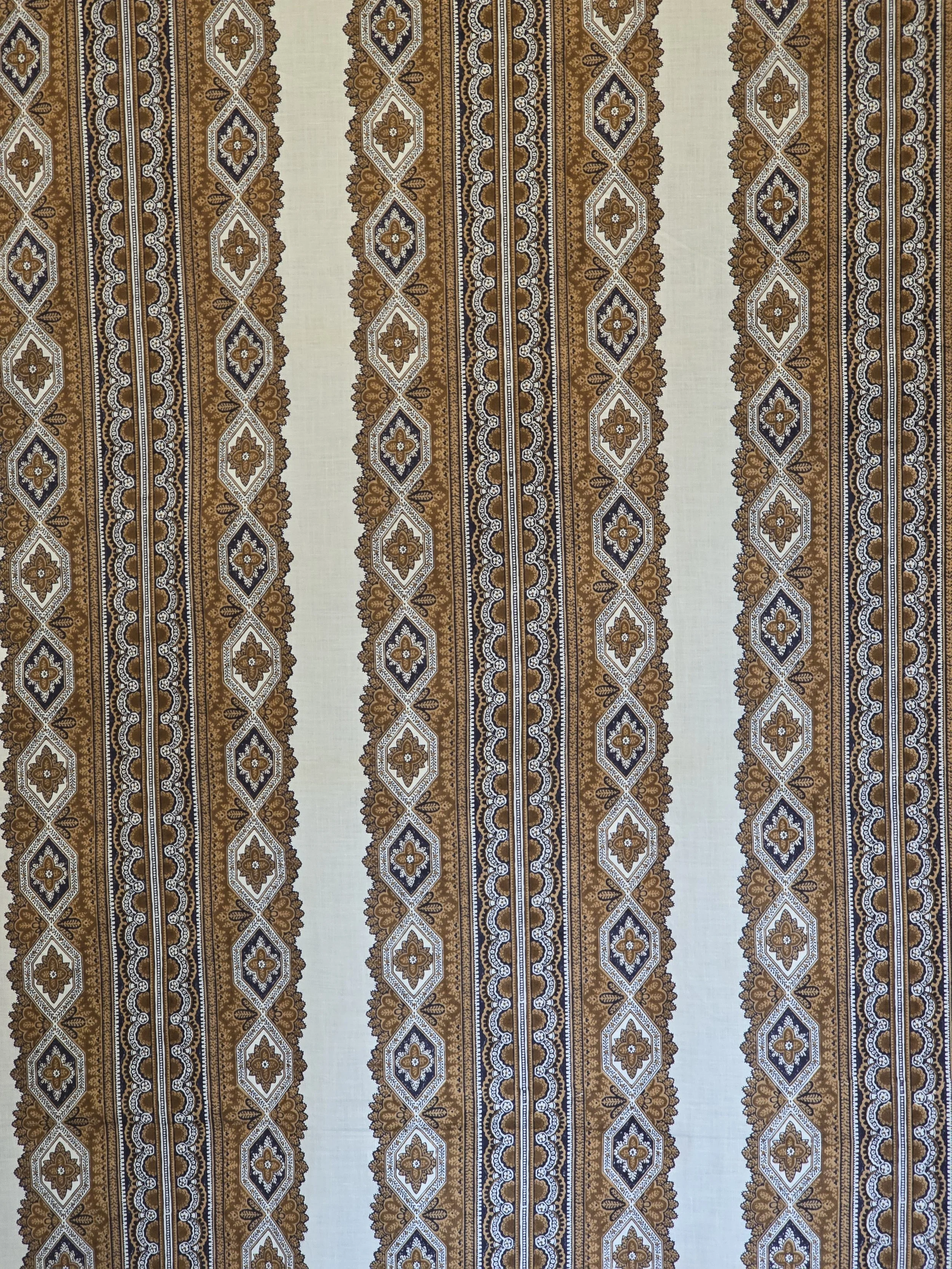 Unused vintage Souleiado Provençal fabric in ochre brown, cream and dark navy, measuring 129 x 100 cm.