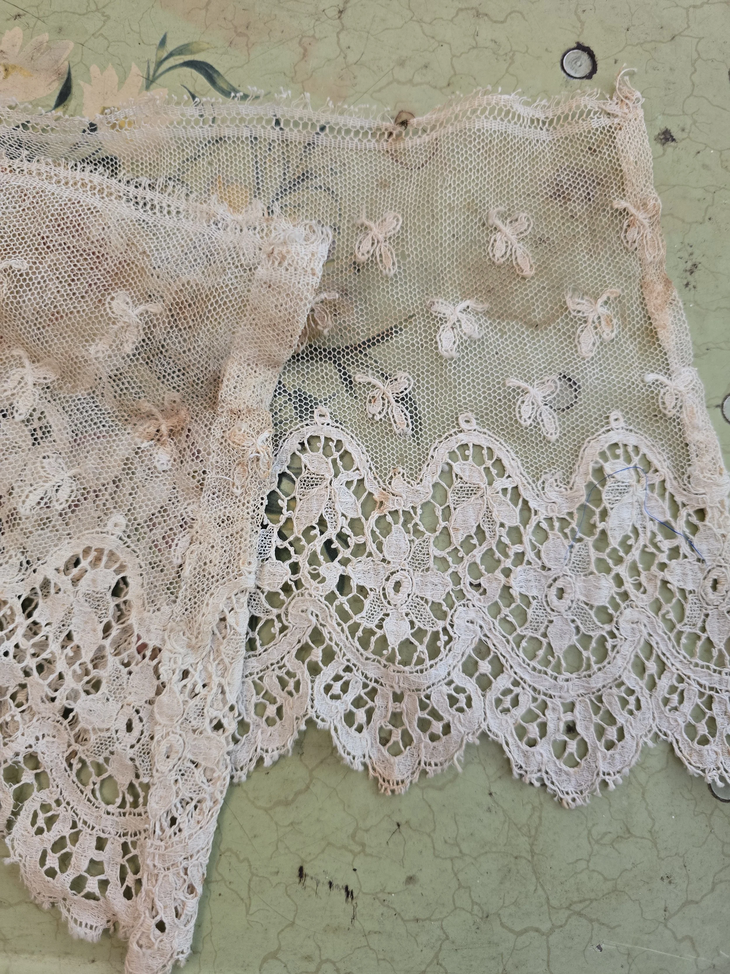 French antique lace border with intricate floral openwork