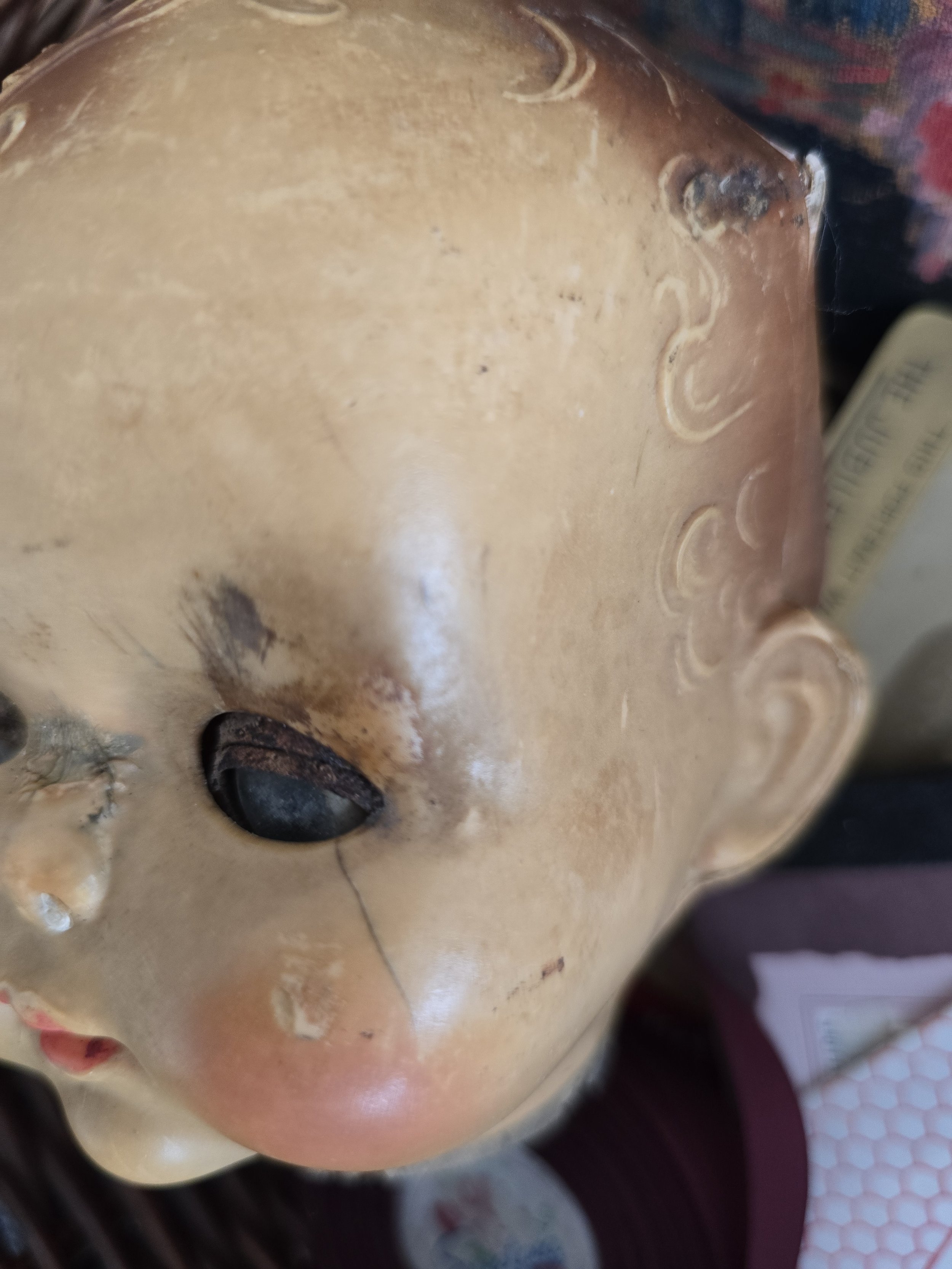 original sleep doll head with aged patina