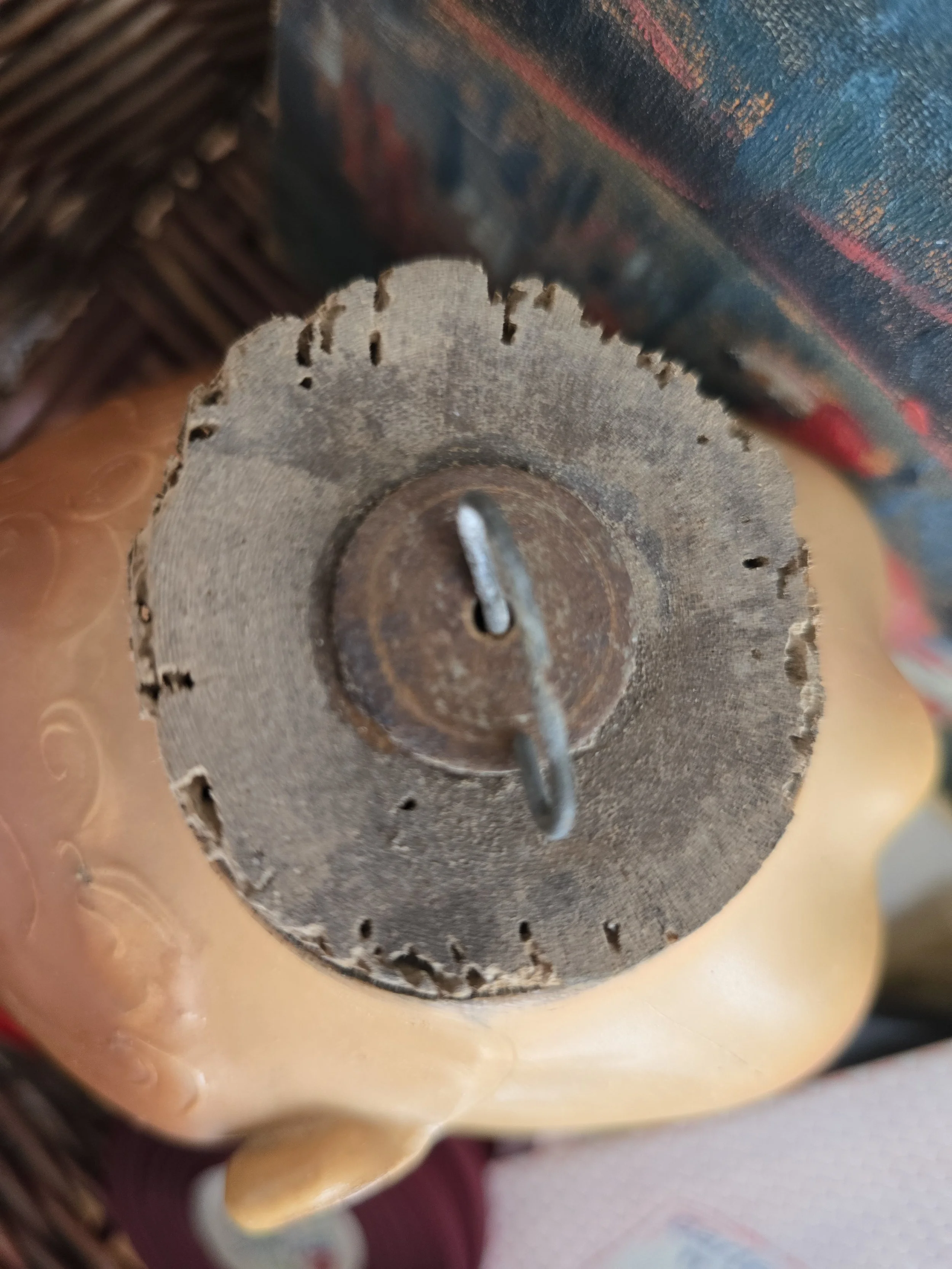 wooden base of original sleep doll head with aged patina