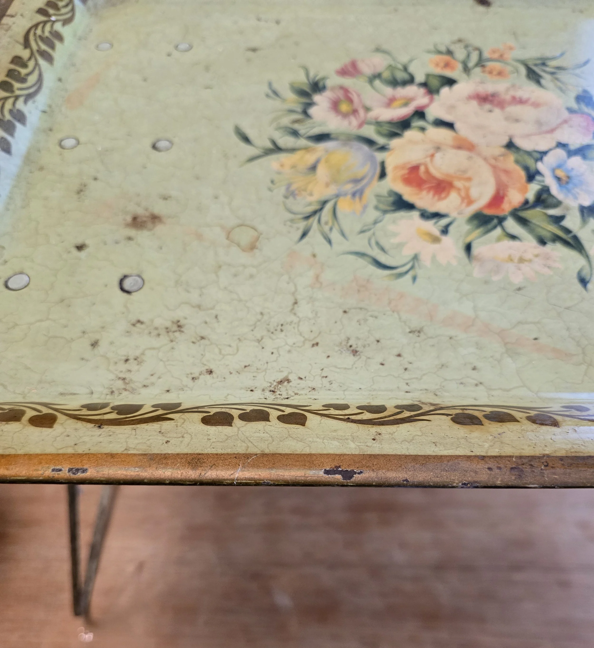 Vintage floral bed tray with folding legs and pastel bouquet design on pale green crackle background. (Copy)