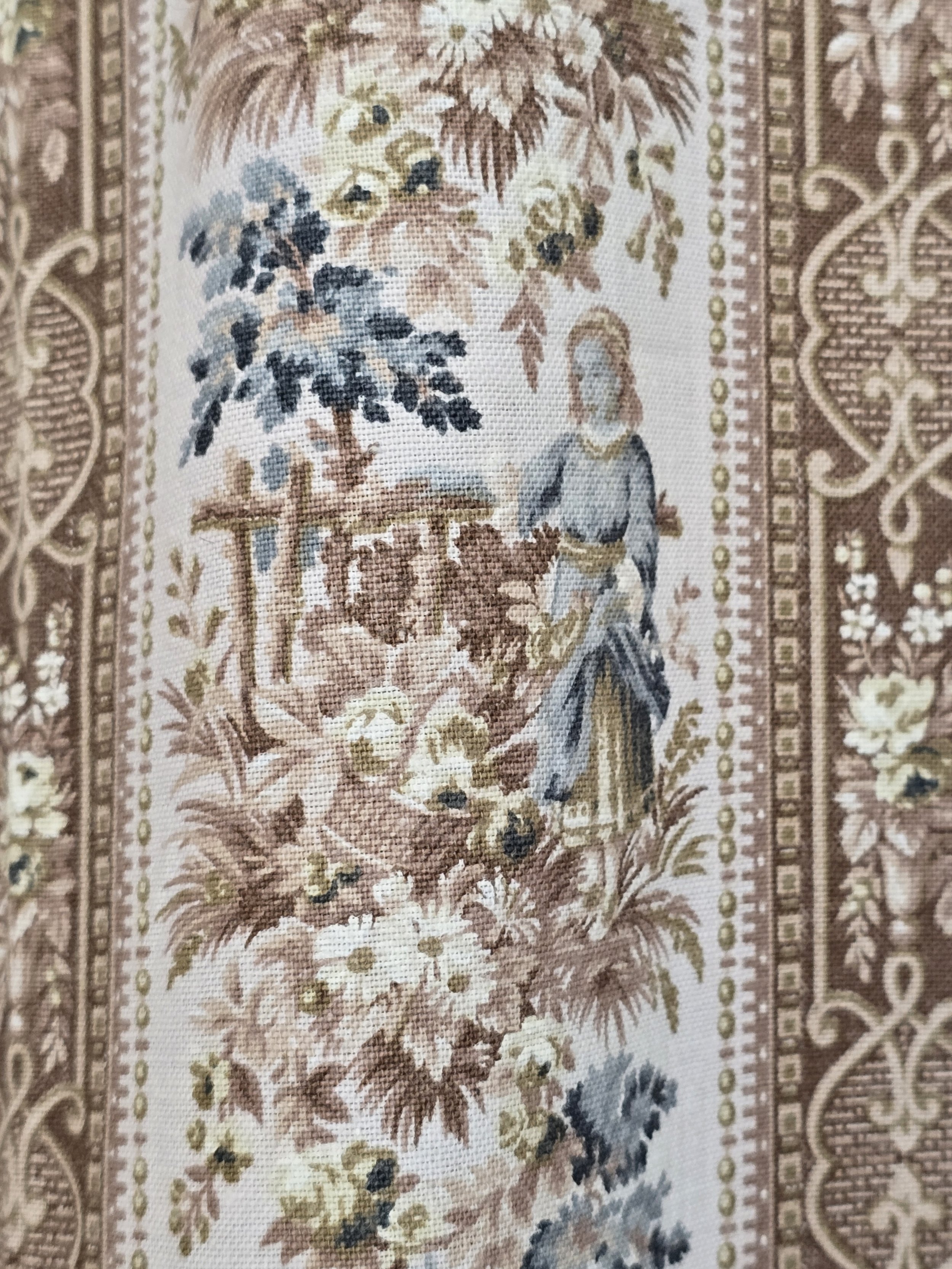 Pastoral motif featuring a woman with flowers in classic toile de Jouy style