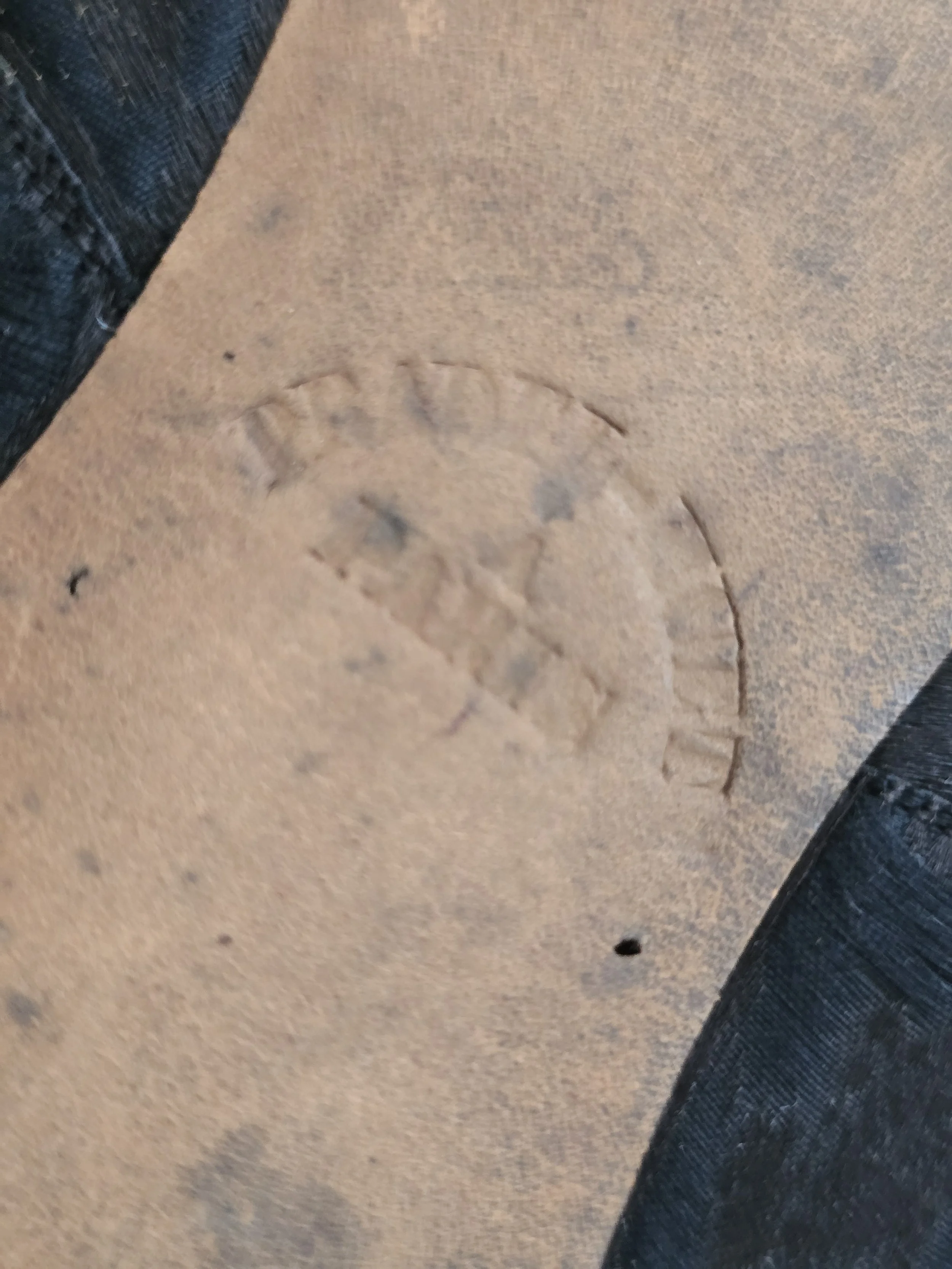 Leather soles with faint Paris maker's stamp