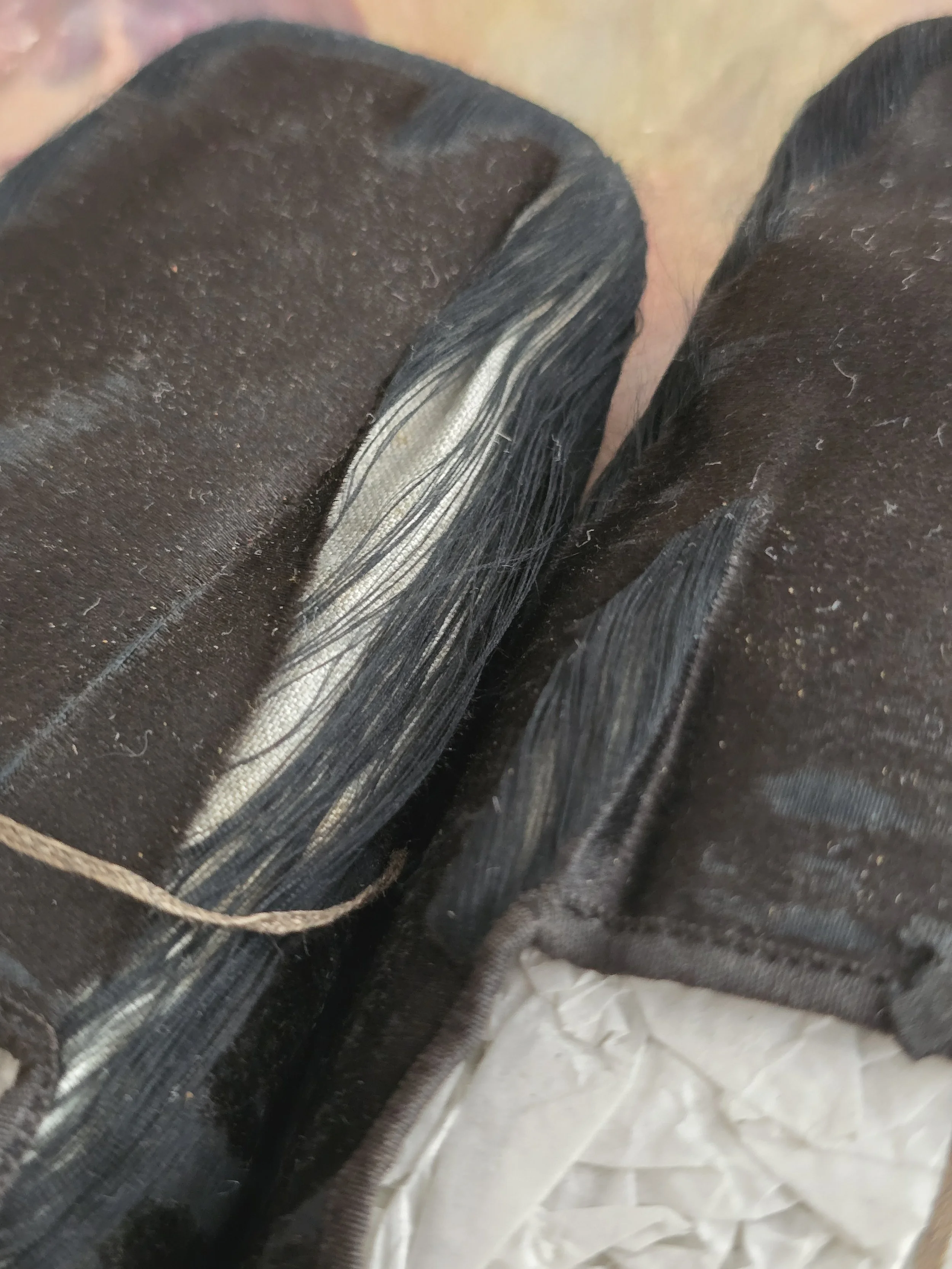 Detail of silk wear and original hand finished seams.