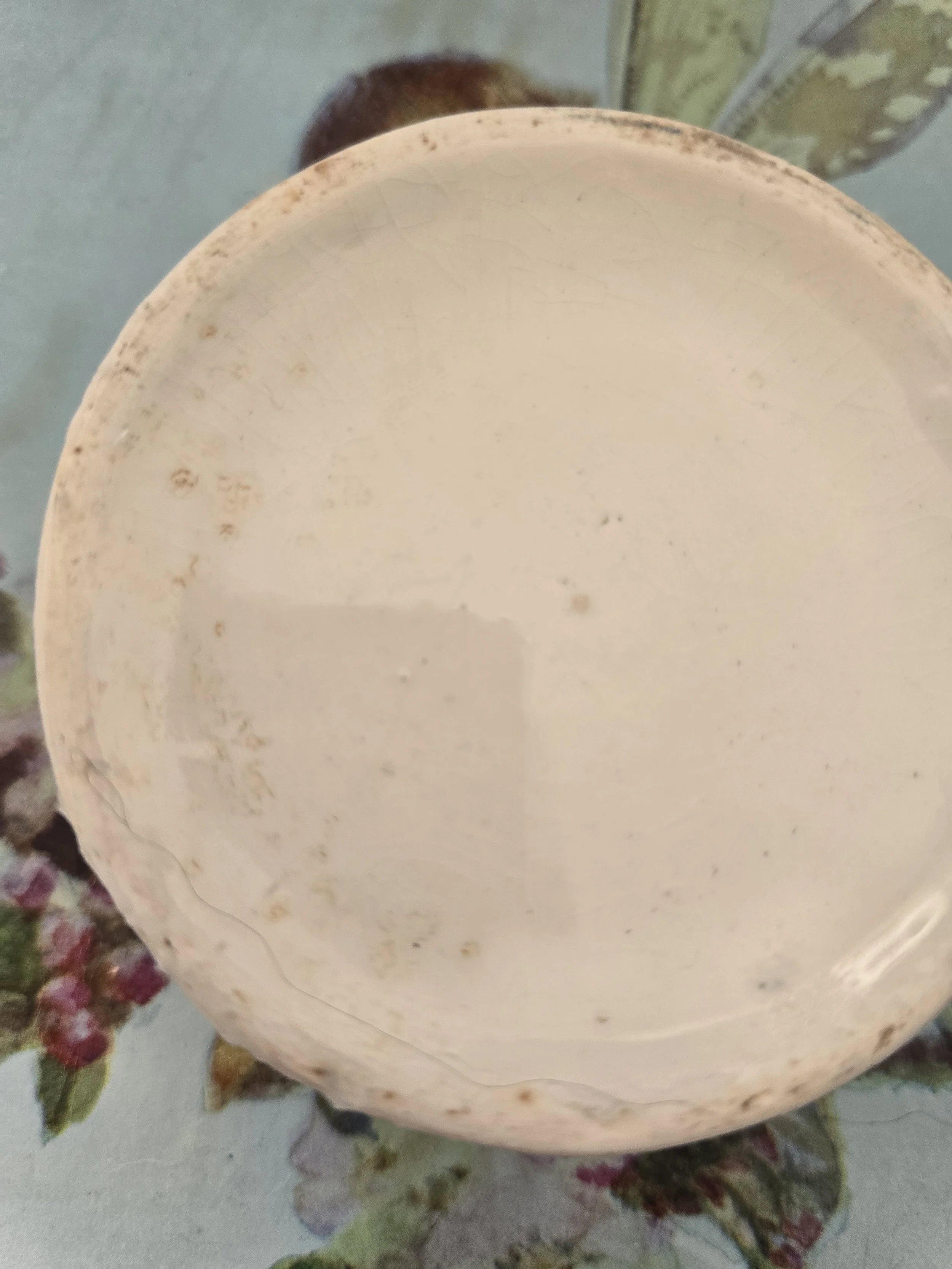 Underside of antique Horrocks and Watson pot showing wear and marks to the base.