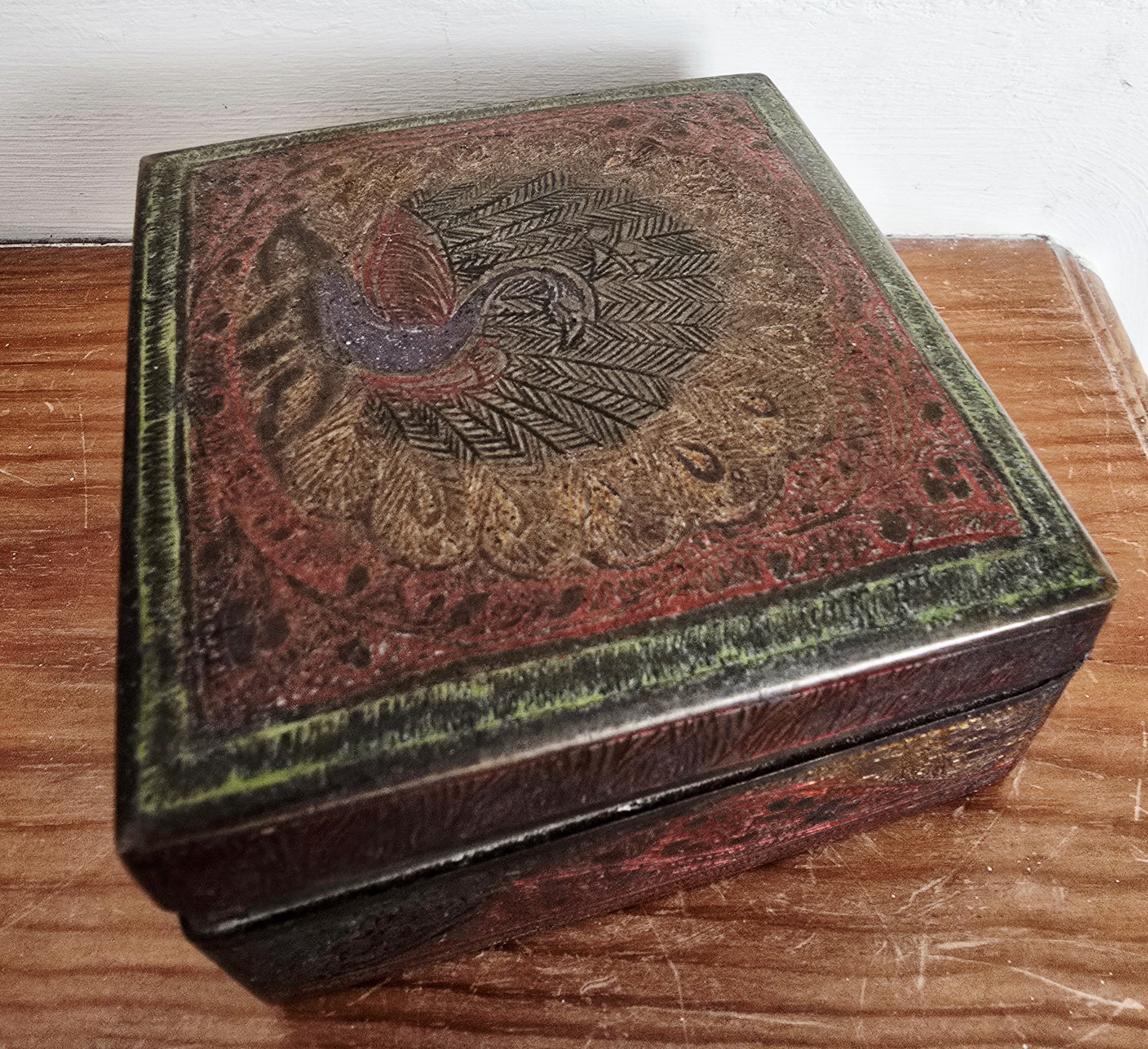 Decorative vintage keepsake box with painted and engraved detail