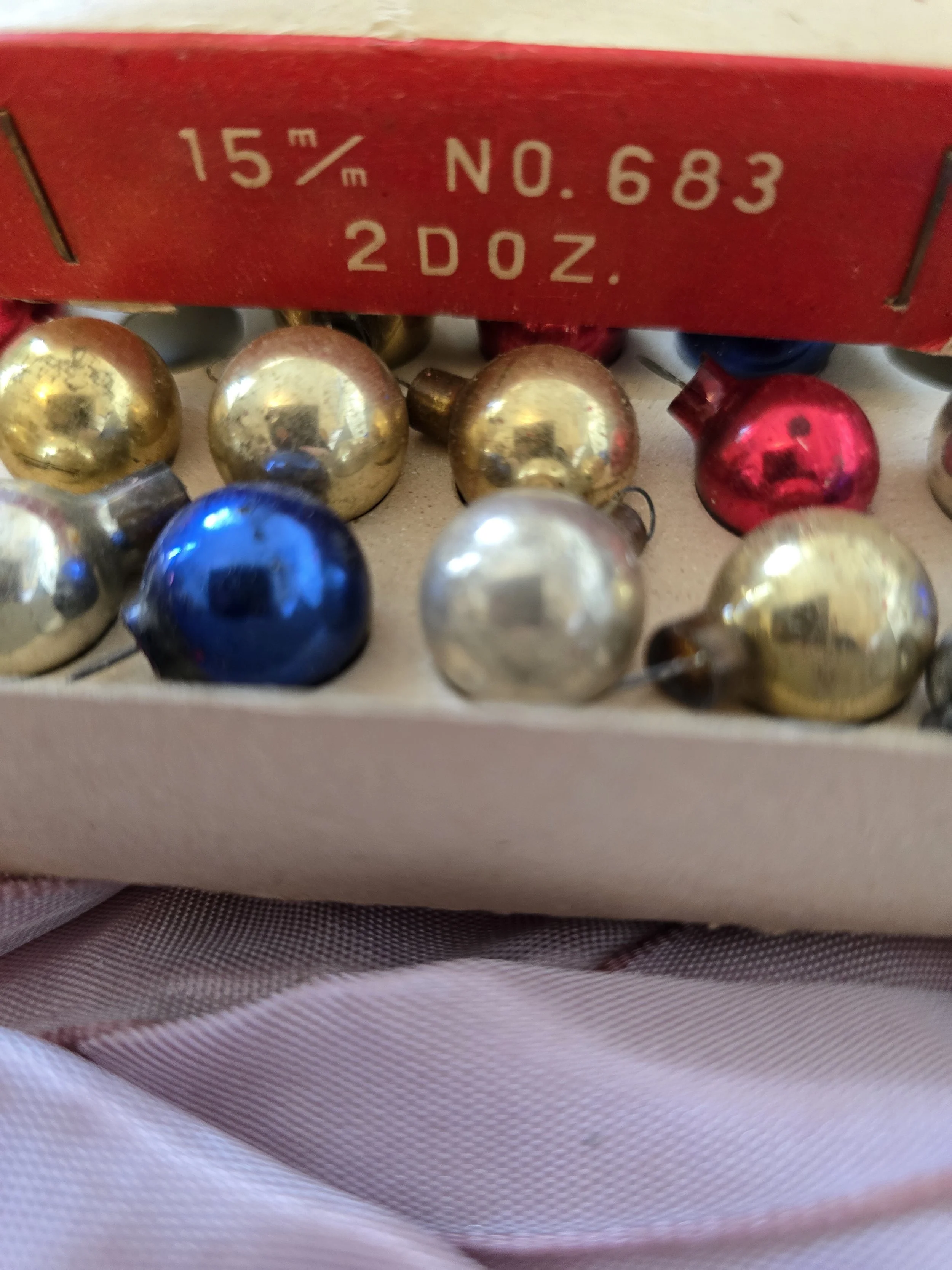 Original Woolworth Christmas decoration packaging marked 15 mm, No. 683 and two dozen.