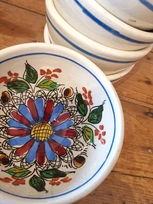 Vintage French rustic floral bowl with hand painted design, part of a set of six.
