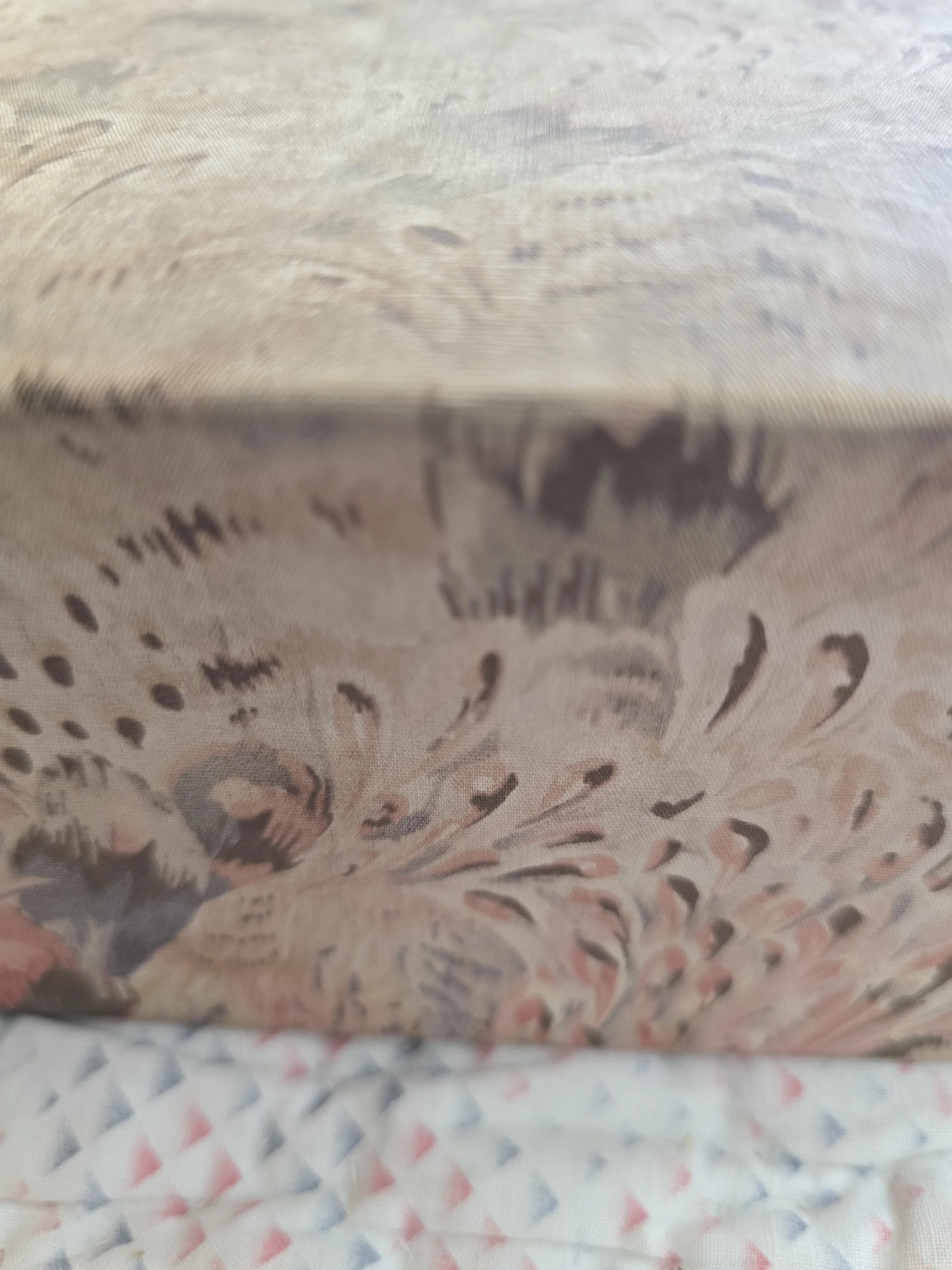 Interior view of vintage fabric-covered box showing original aged lining.