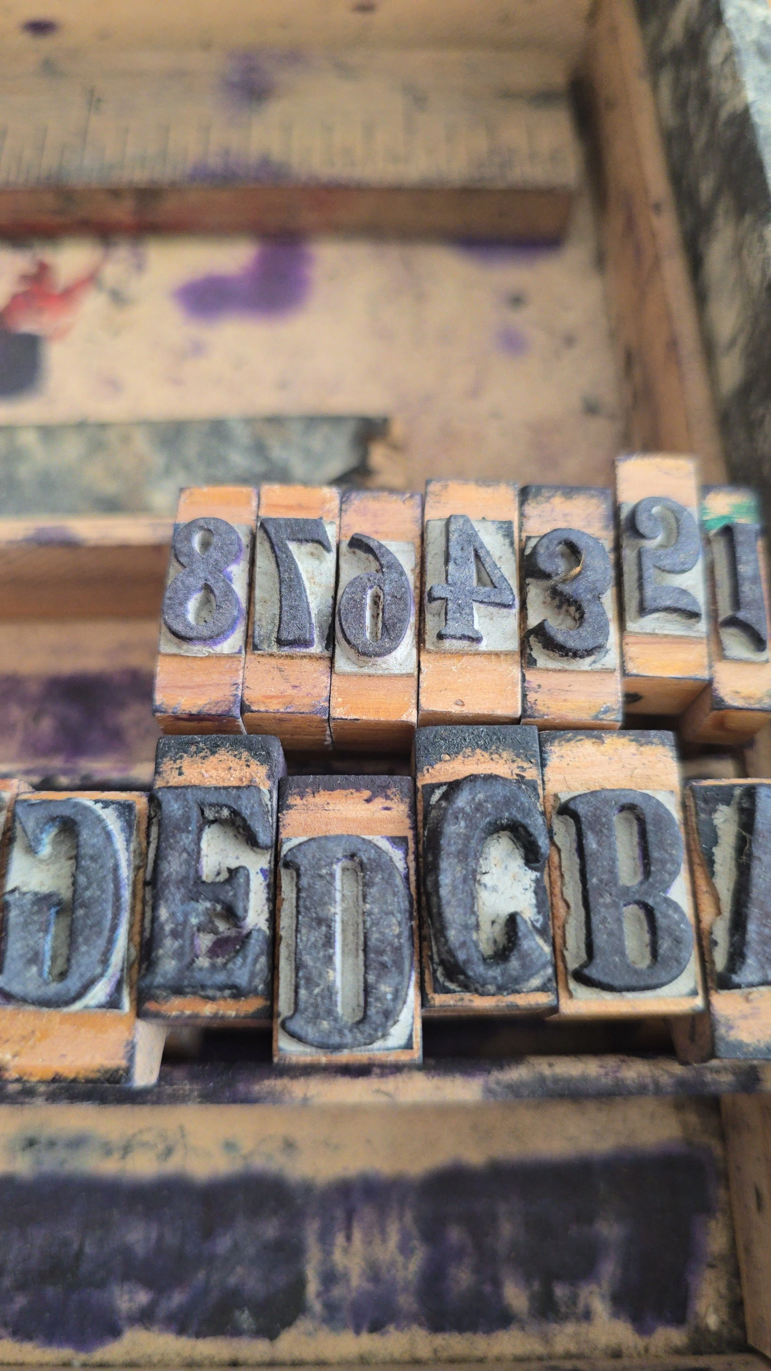 Rare antique rubber stamp set with typography and special characters.