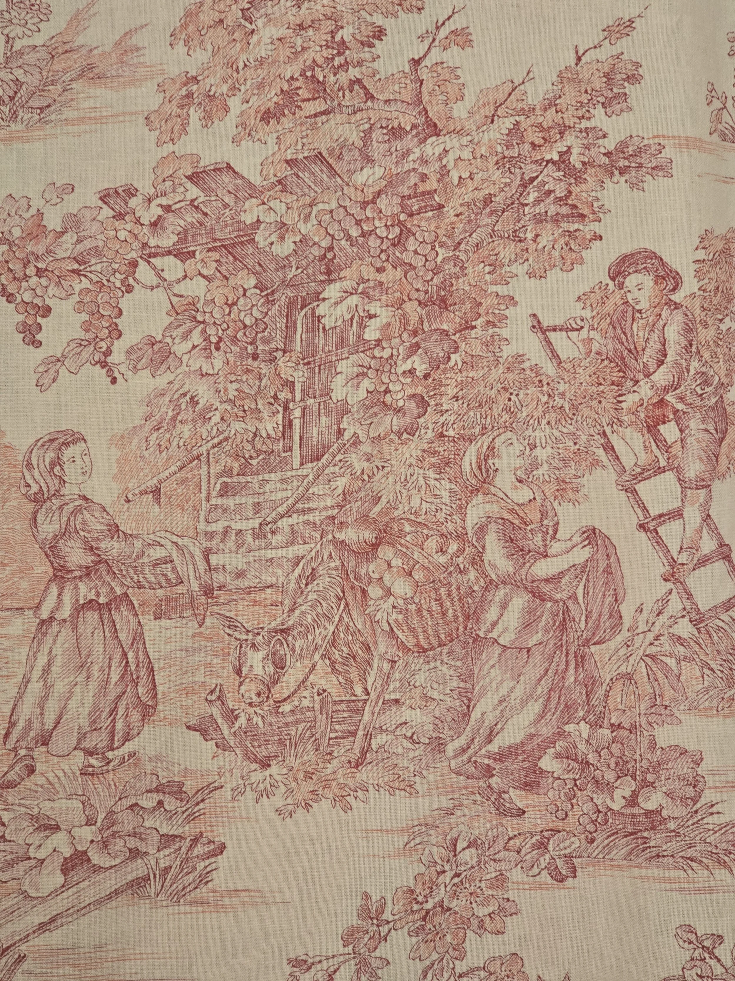 French toile fabric depicting figures working in fields, a small boat and a woman beside a tree.