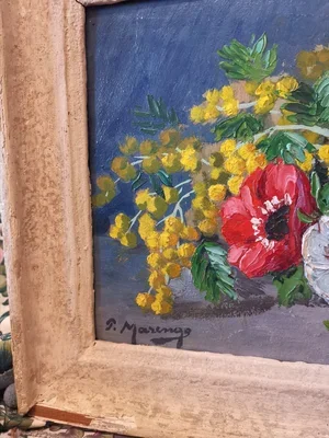 Close-up showing textured oil paint brushstrokes of mimosa and anemones