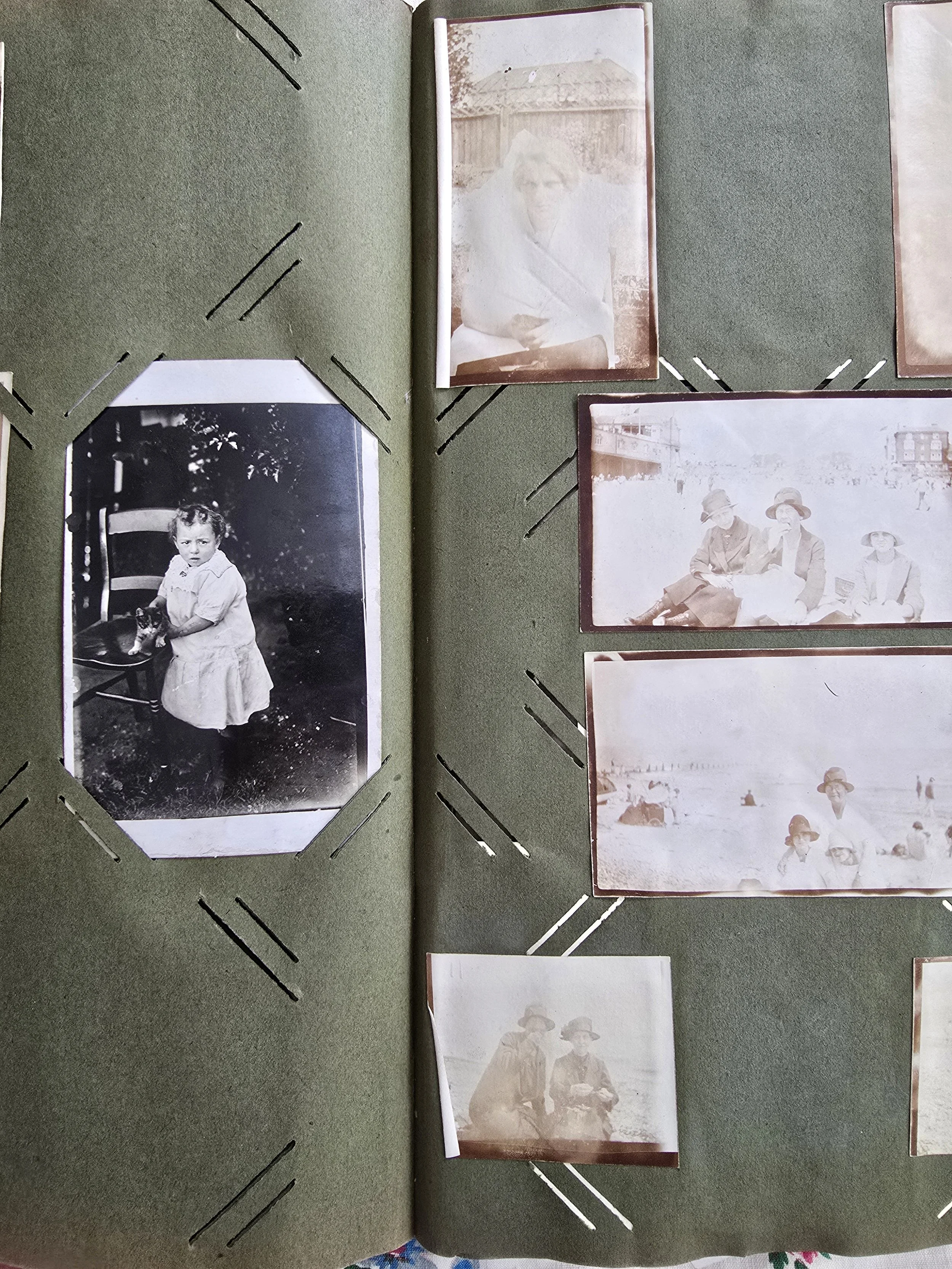 vintage-family-photo-album-green-pages-child-portrait.jpg.jpg