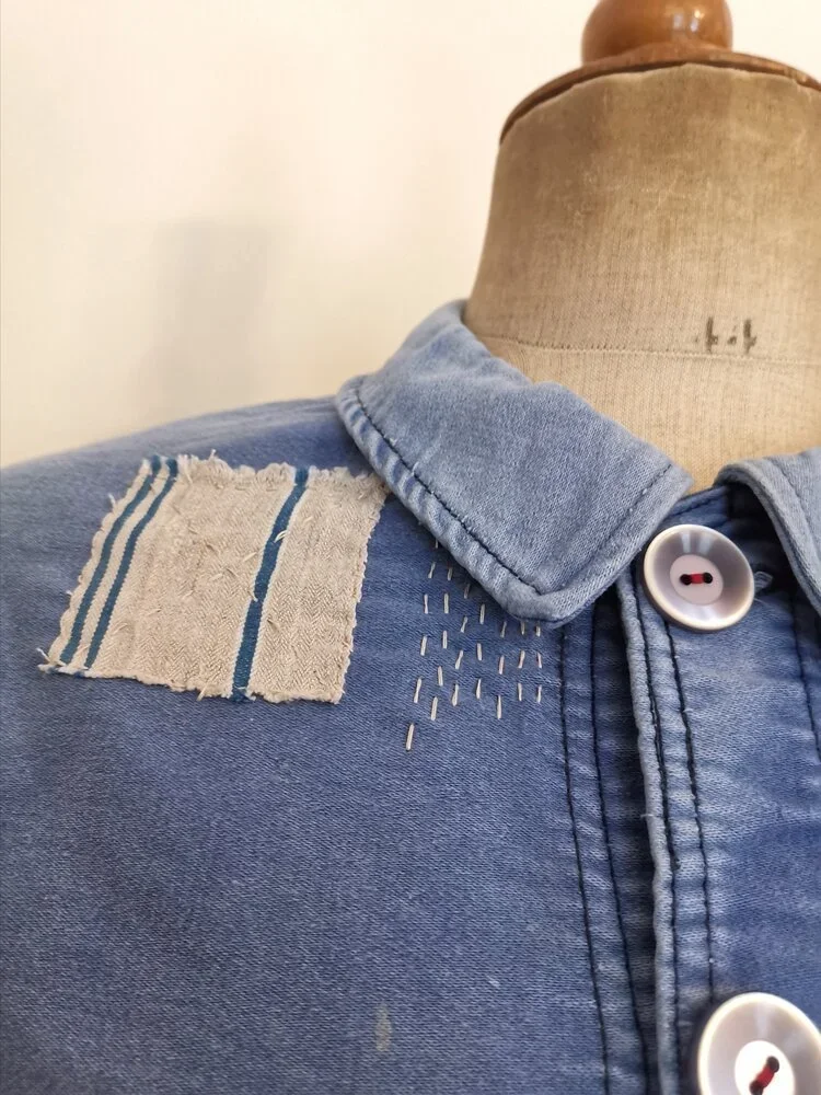 1960s French moleskin chore coat customised with sashiko and antique fabric patches.