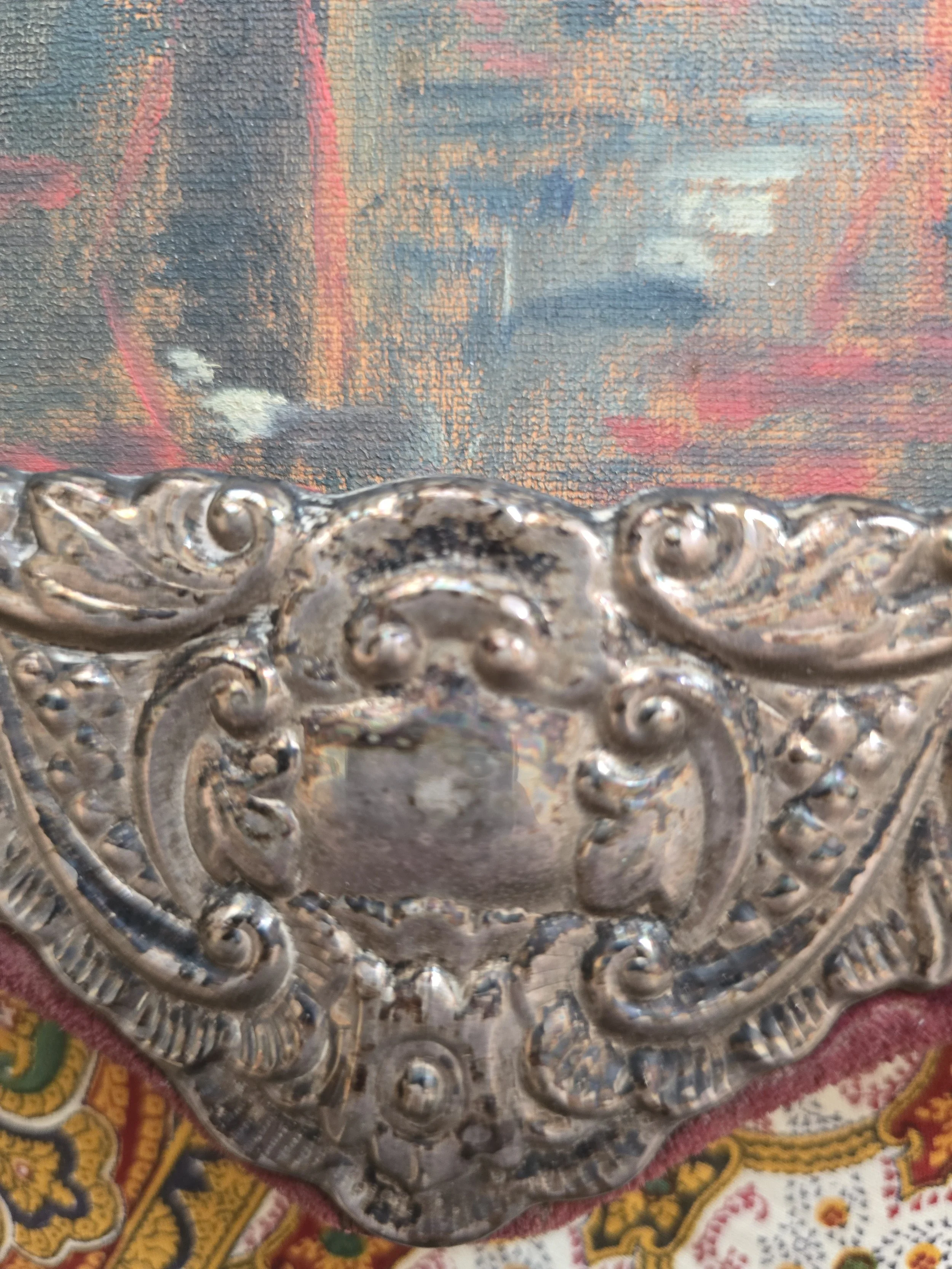 Decorative Victorian photo frame with elaborate floral and scrollwork border