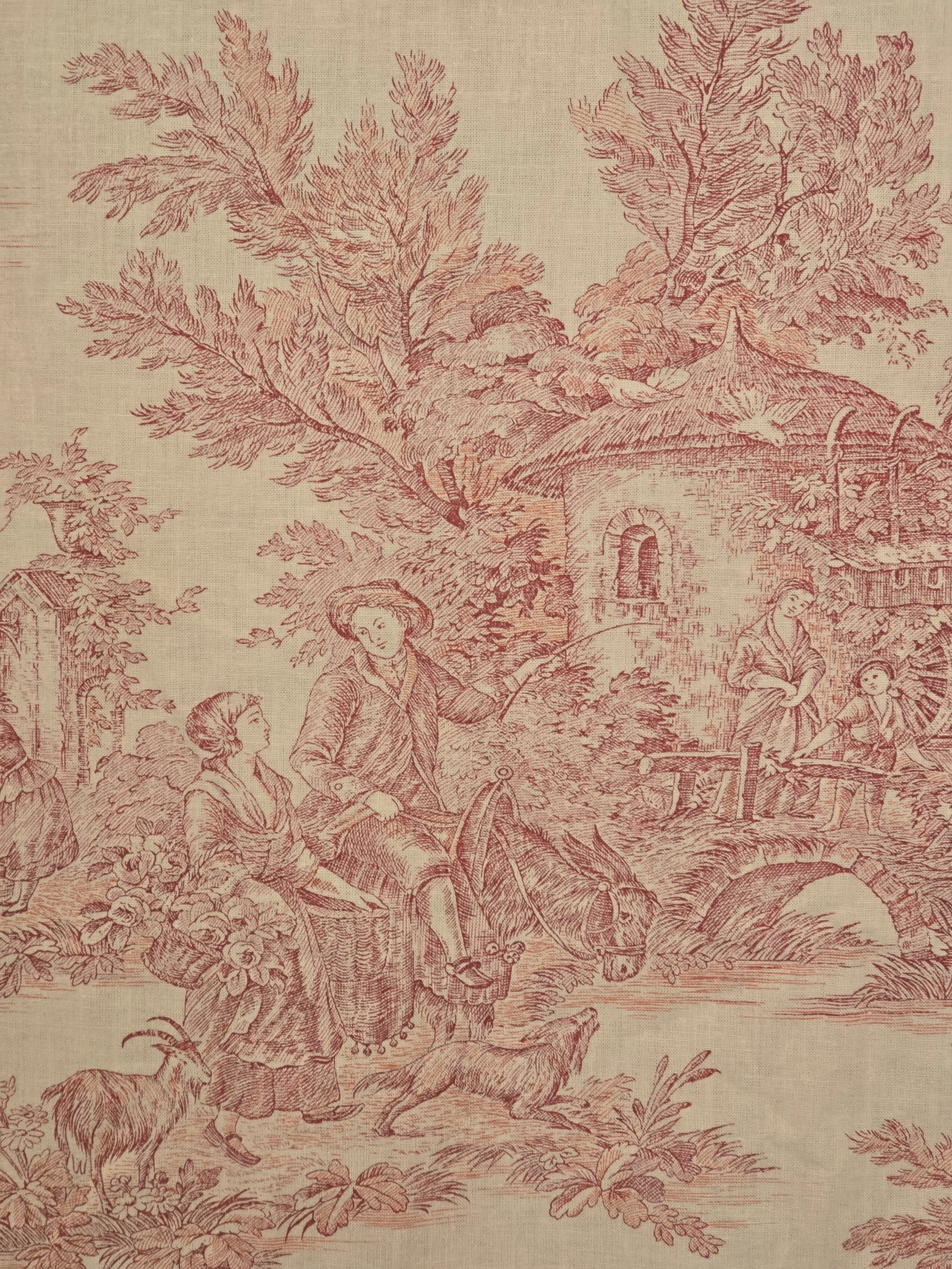 Detailed raspberry red toile scene with figures gathering grapes, baskets and a donkey.