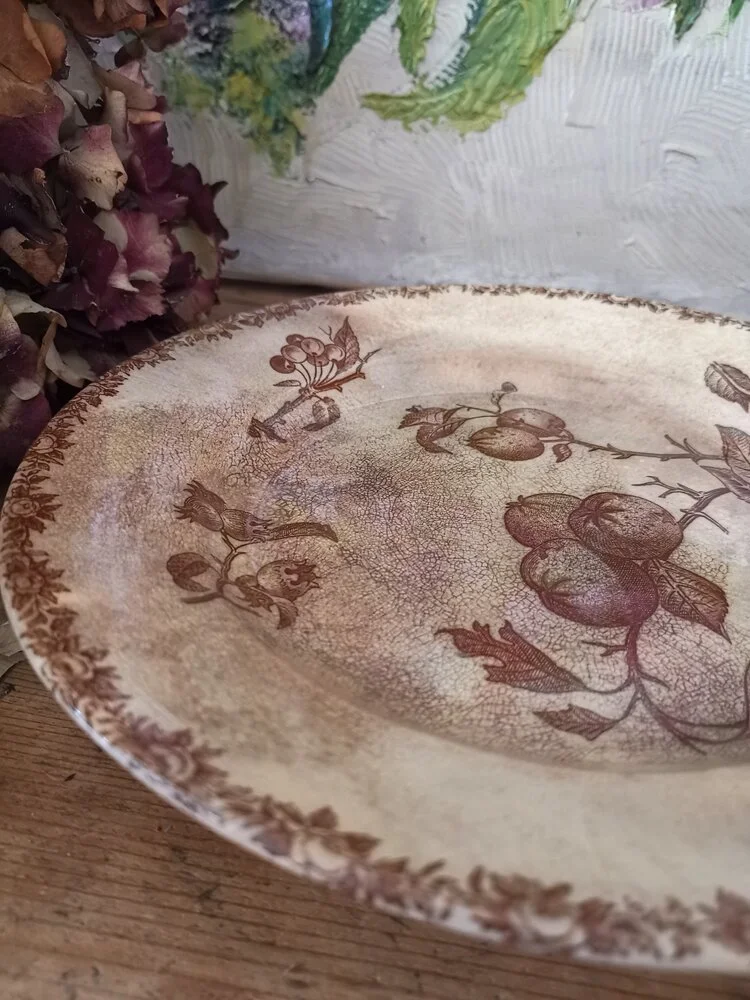 : Overhead view of brown transferware pattern