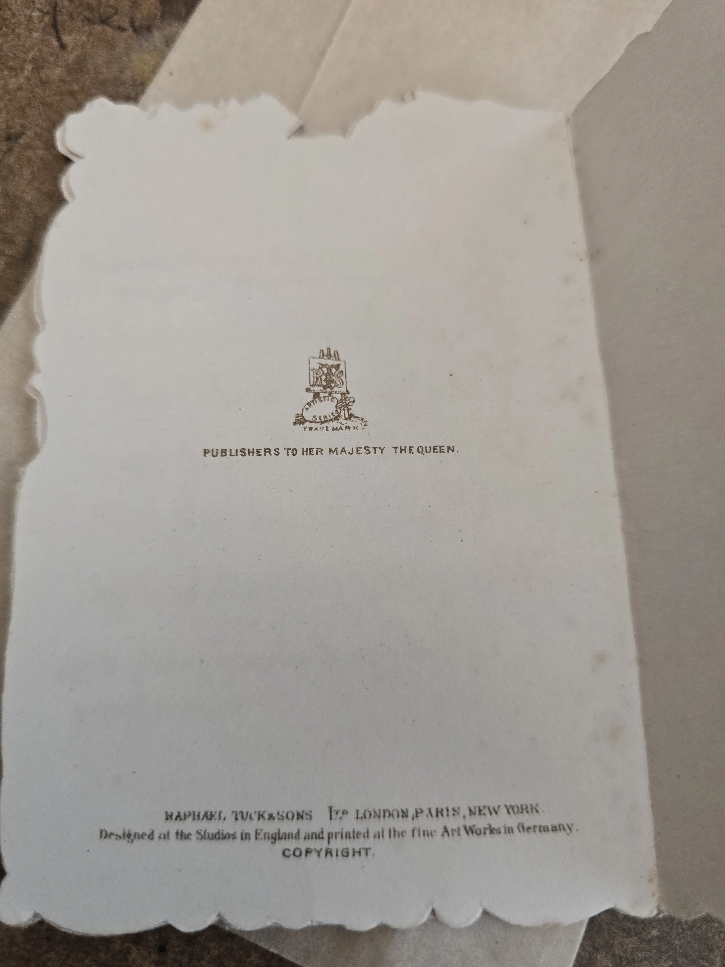 Raphael Tuck & Sons publisher mark and printed details on reverse of antique Christmas card